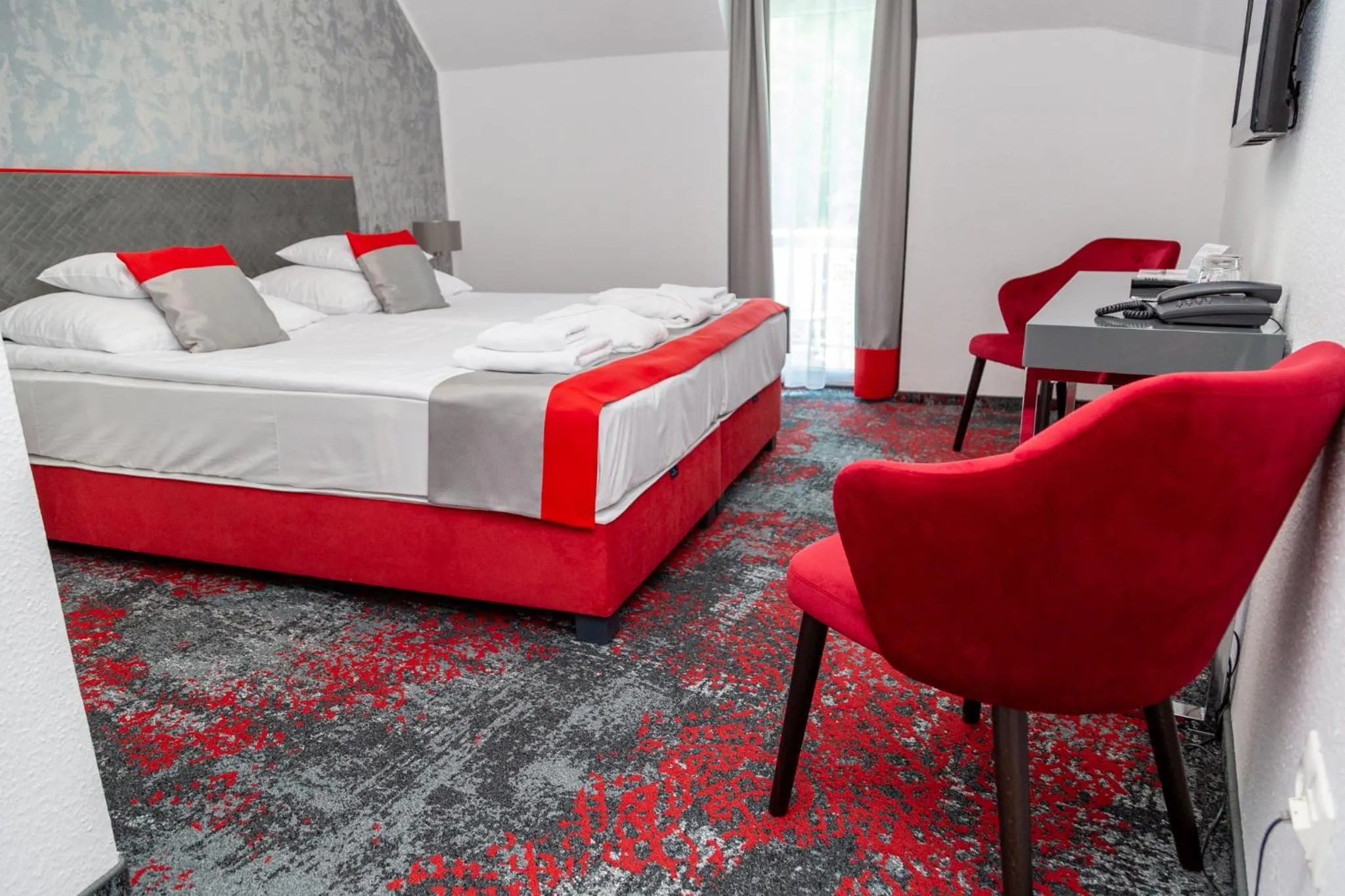 Bed in Liget Wellness és Konferencia Hotel