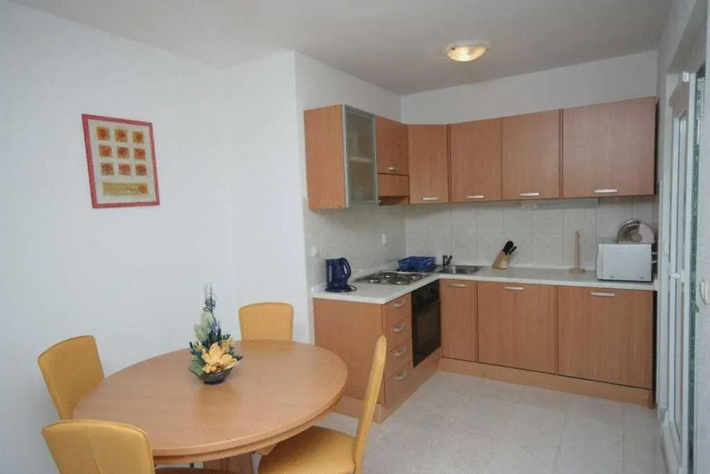 Kitchen or kitchenette in Apartments Villa Bayview
