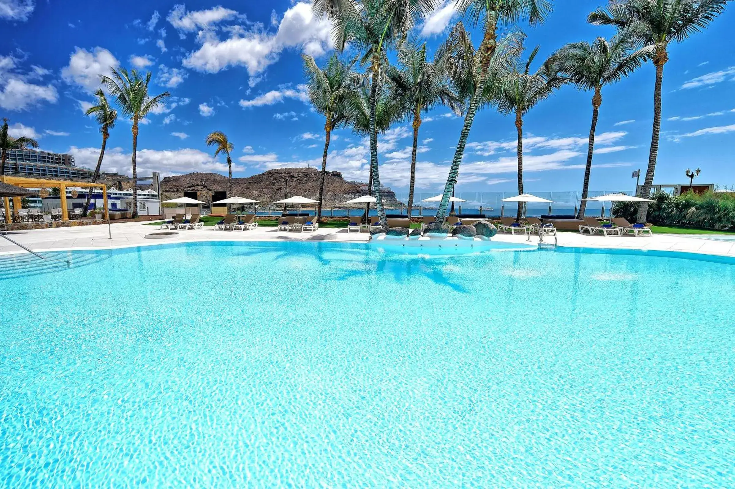 Swimming pool in H10 Costa Mogán - Adults Only Swimming pool in H10 Costa Mogán - Adults Only