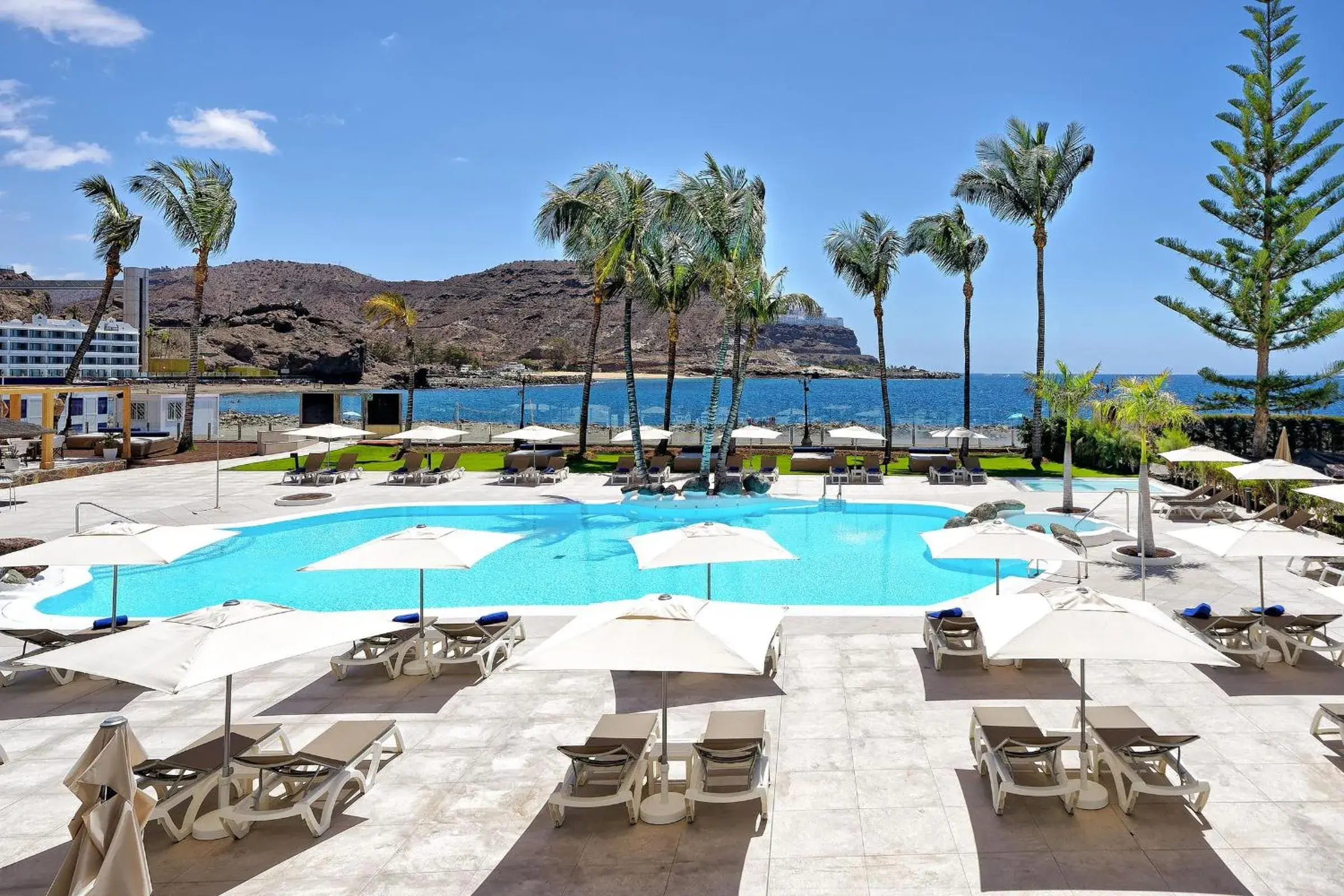 Swimming pool in H10 Costa Mogán - Adults Only Swimming pool in H10 Costa Mogán - Adults Only