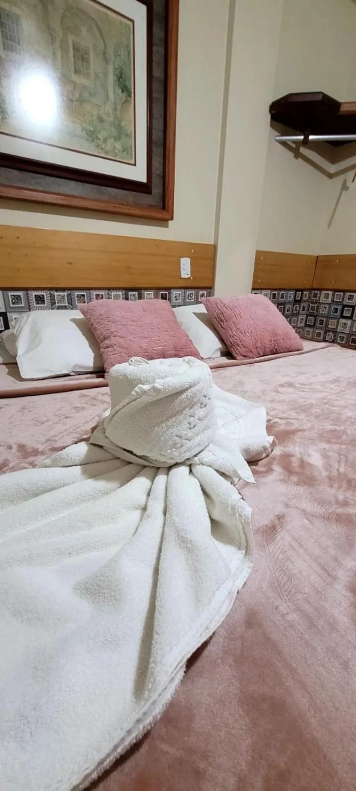 towels, Bed in Pousada Sonho Meu Foz
