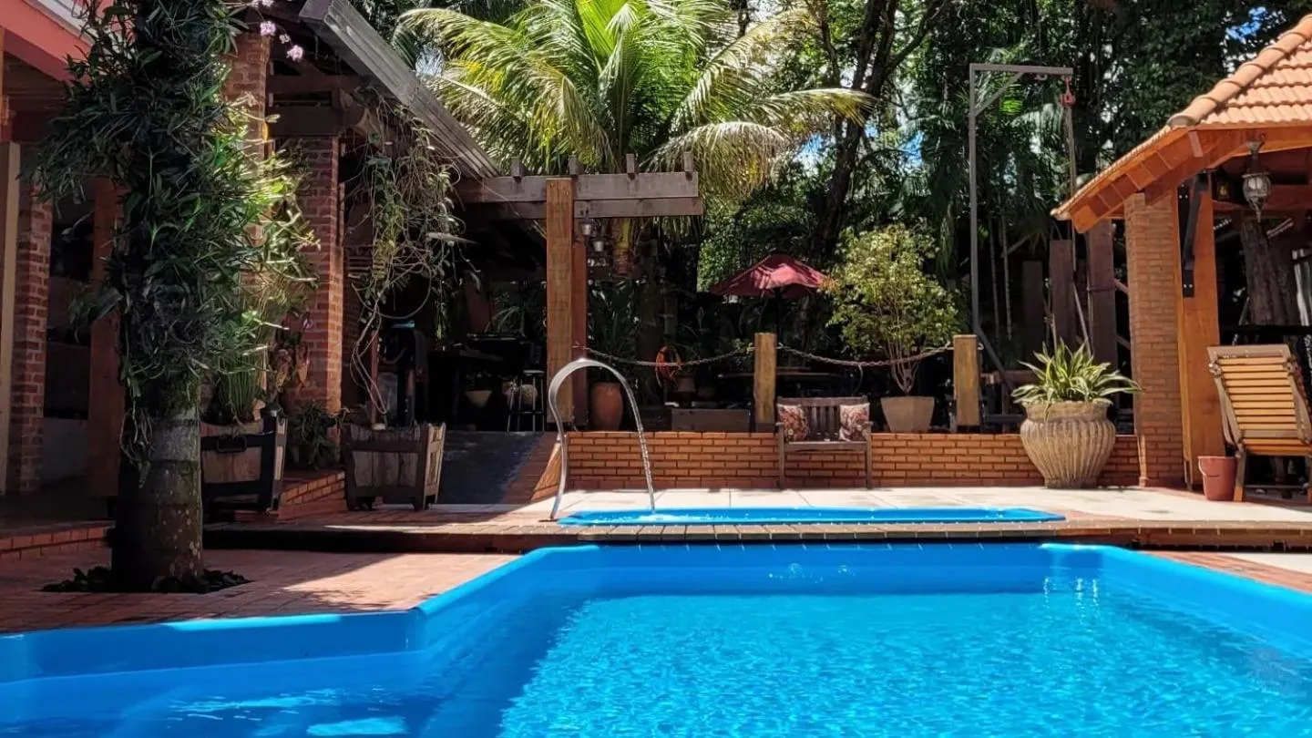 Swimming pool in Pousada Sonho Meu Foz