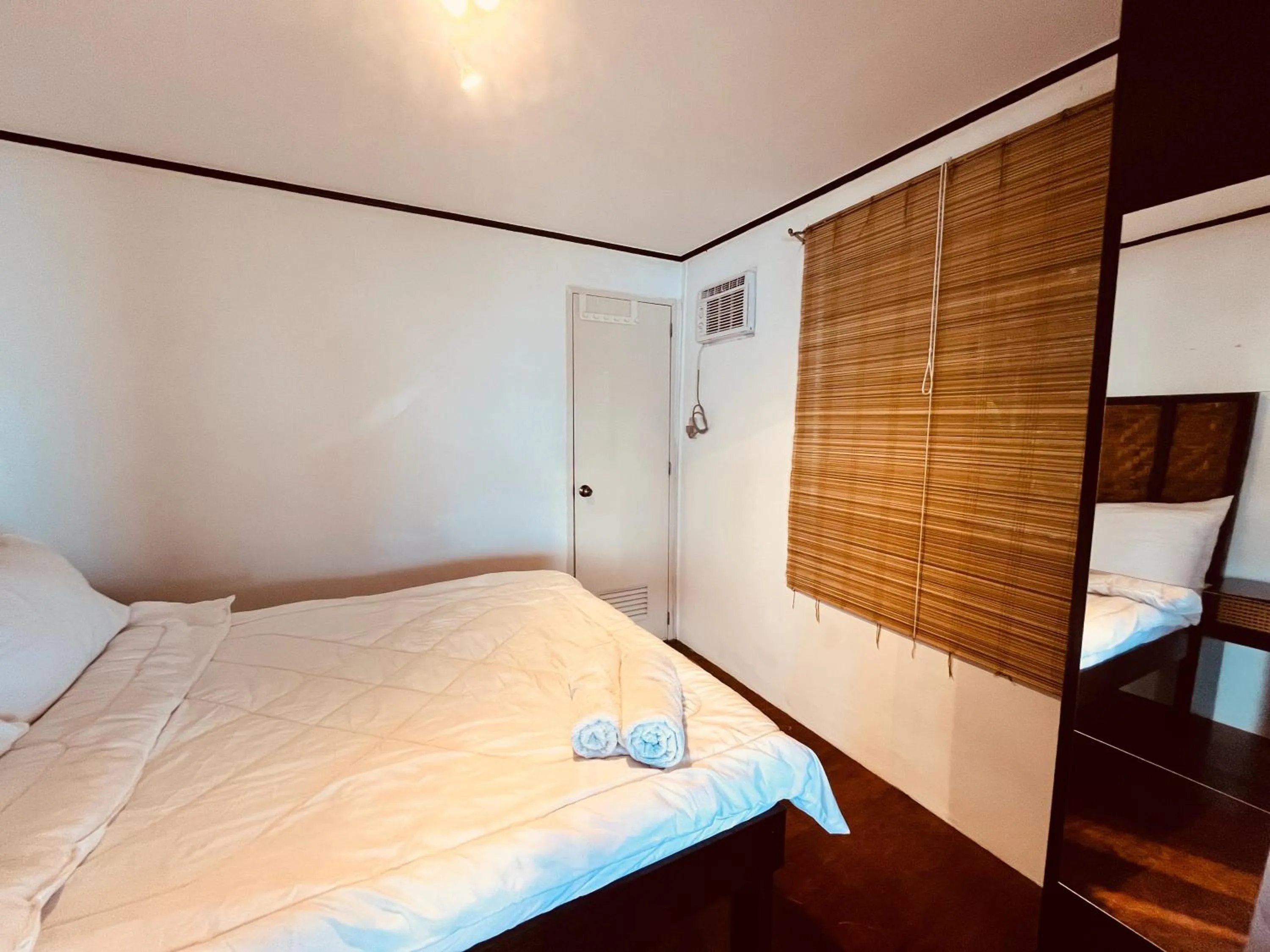 Bed in Villa Milagros Dive Inn Anilao