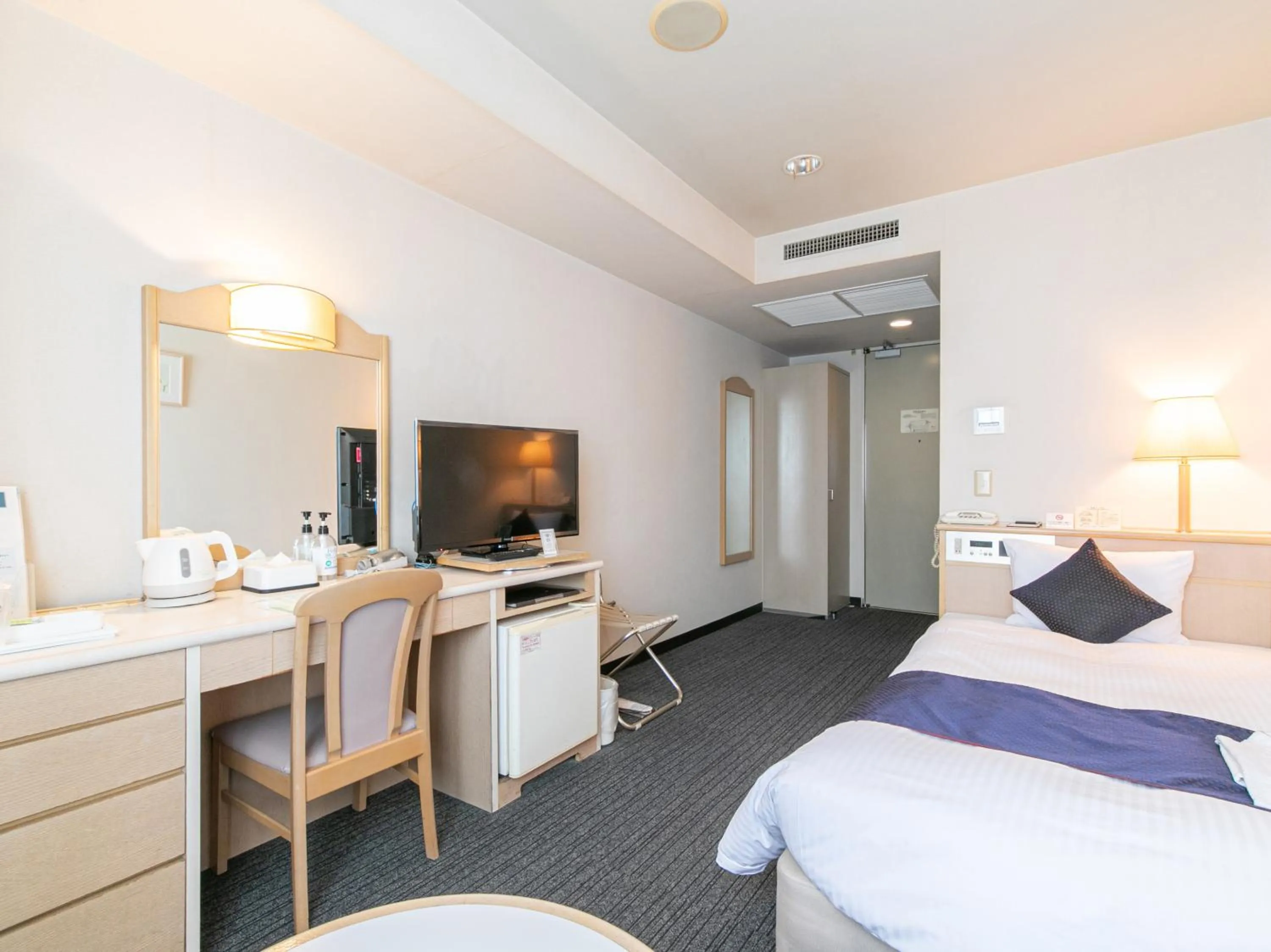 Communal lounge/ TV room, Bed in Hotel Verfort Hyuga