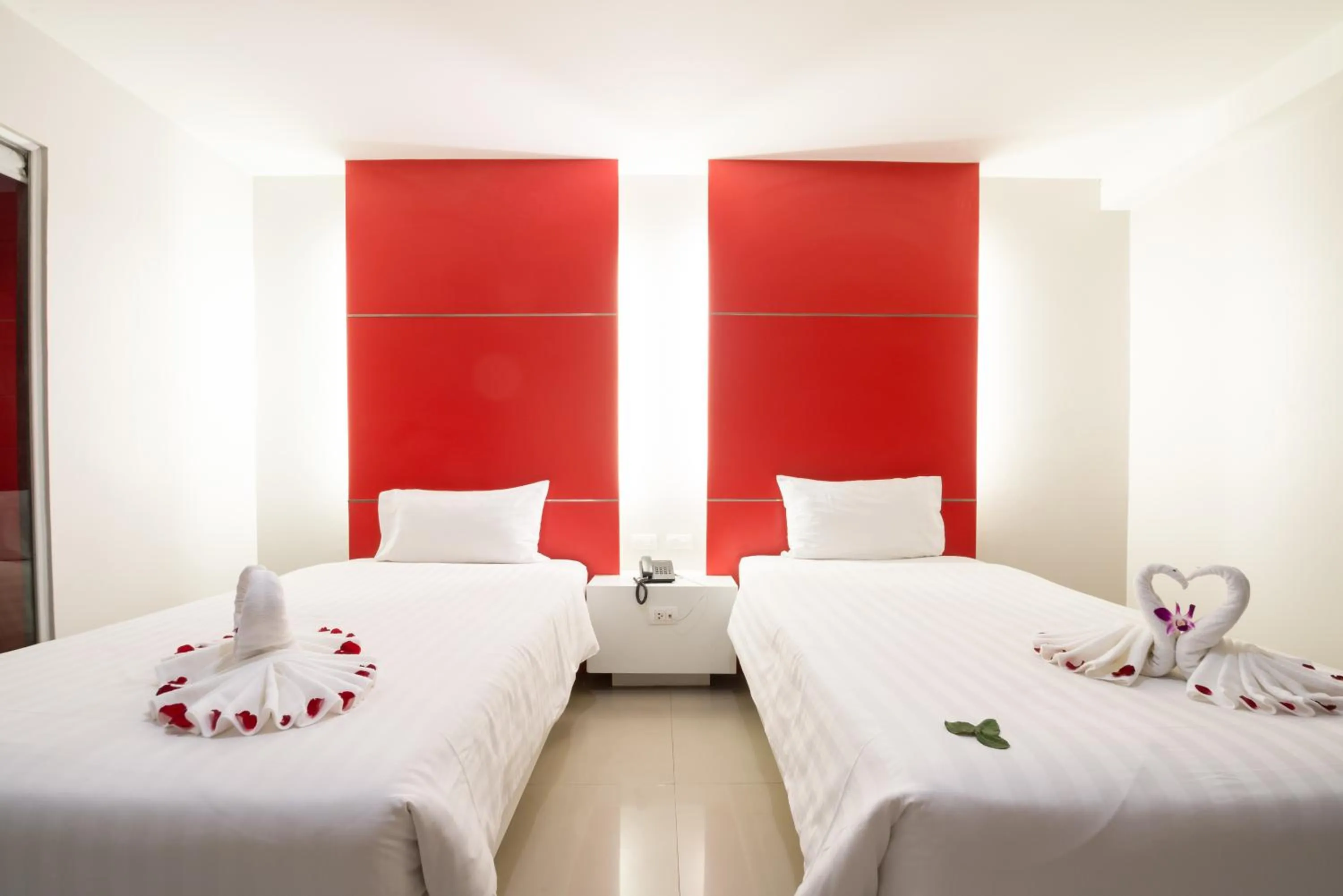 Photo of the whole room, Bed in Alfresco Phuket Hotel