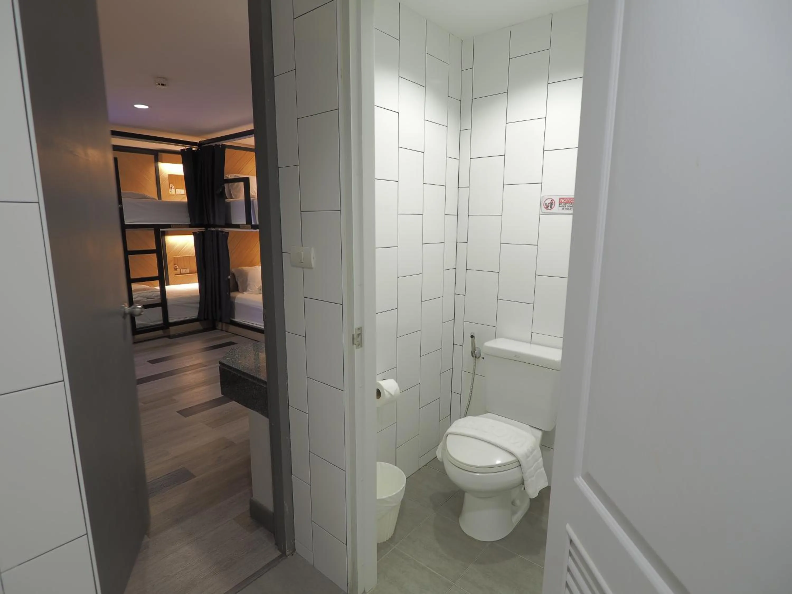 Toilet in Alfresco Phuket Hotel