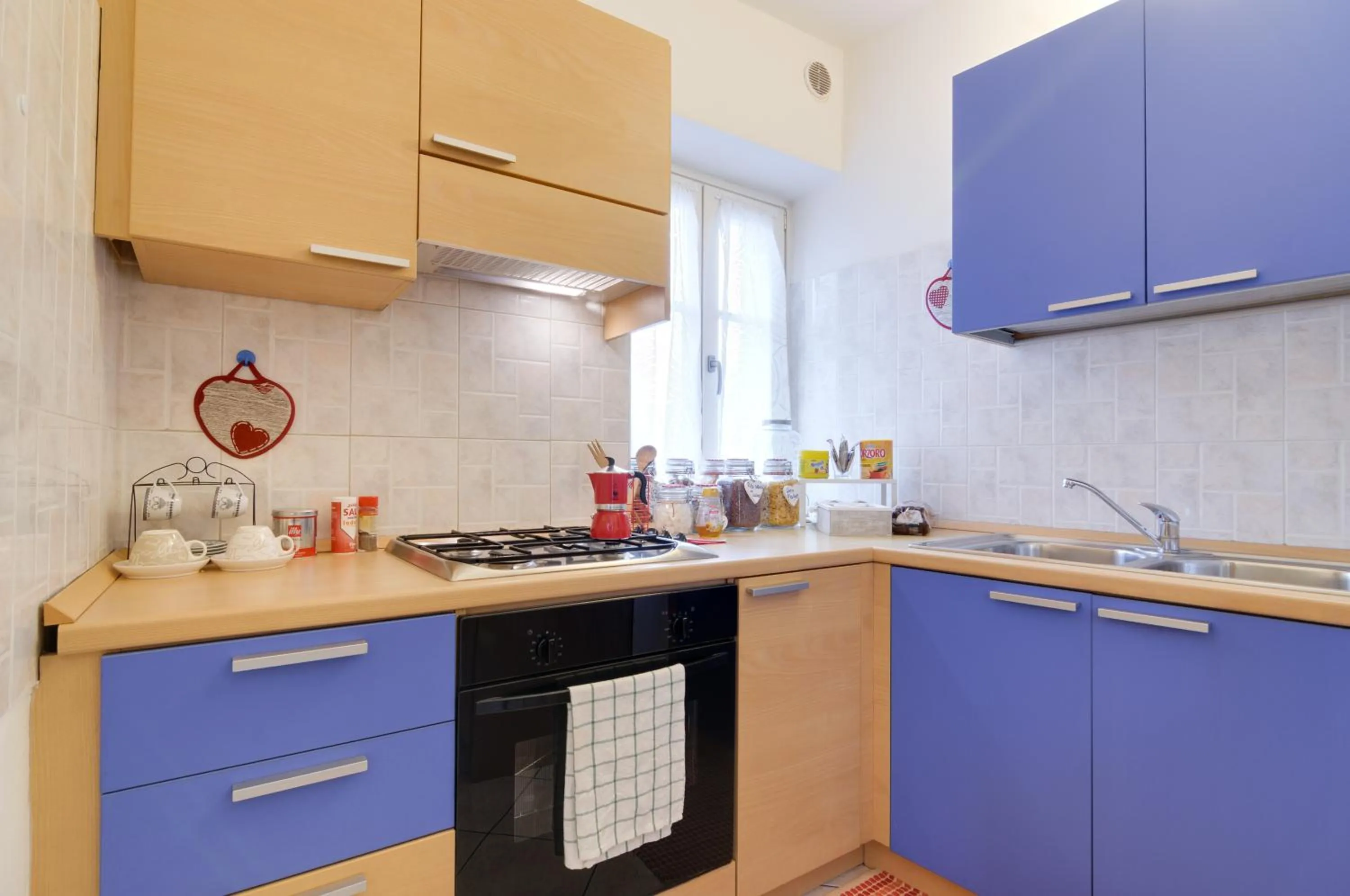 Communal kitchen in B&B and Apartments Al Duomo