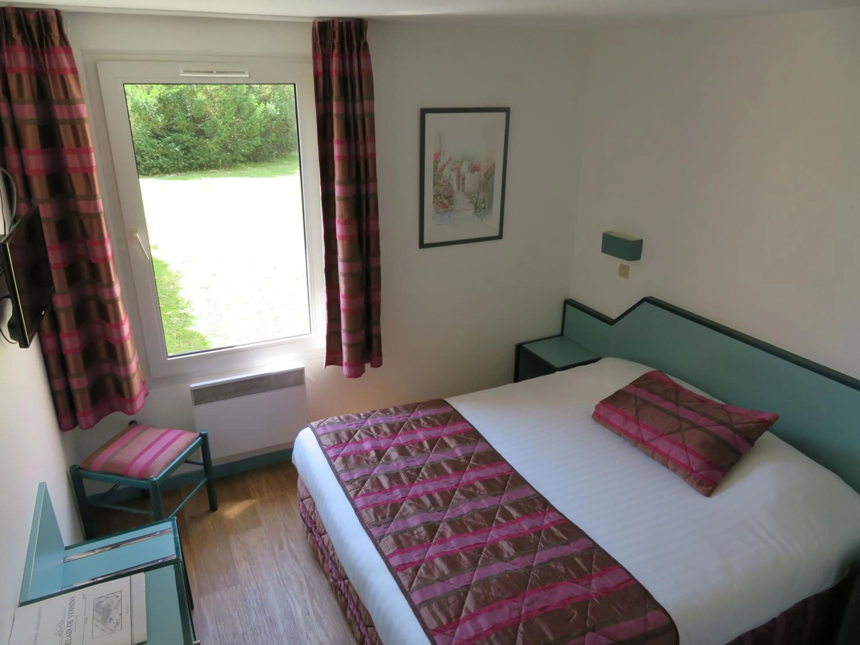 Garden view, Bed in Le Relais de Voisins