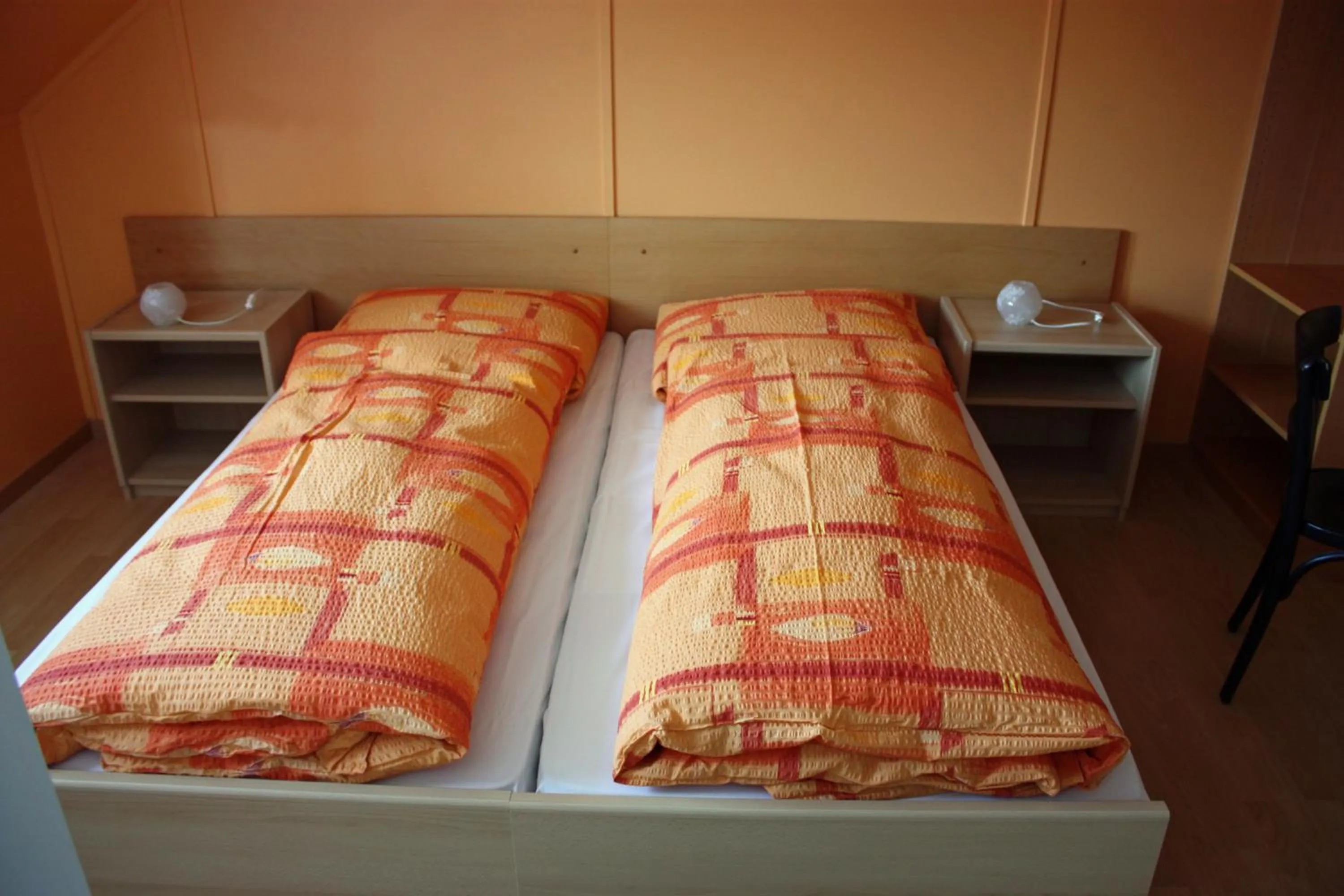 Bed in Hotel Koi-Gartenteich