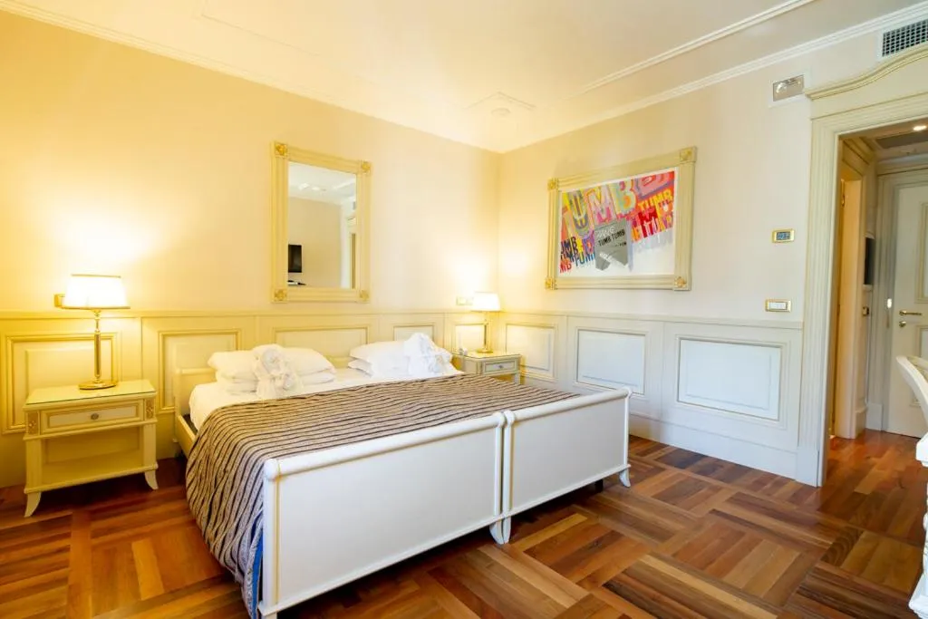 Bed in Hotel De Paris Sanremo