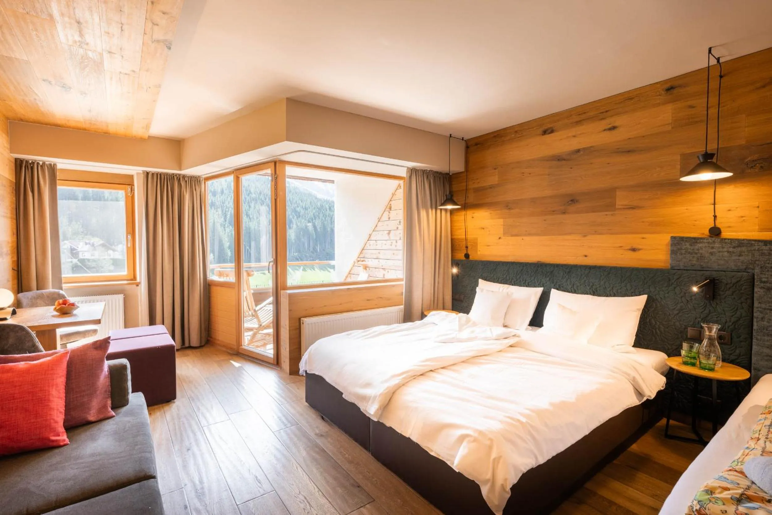 Living room, Bed in Almhof Family und Wellness Resort