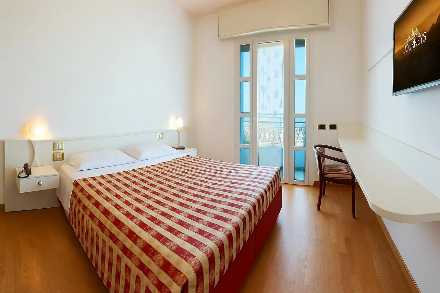 Bed in Ruhl Beach Hotel & Suites