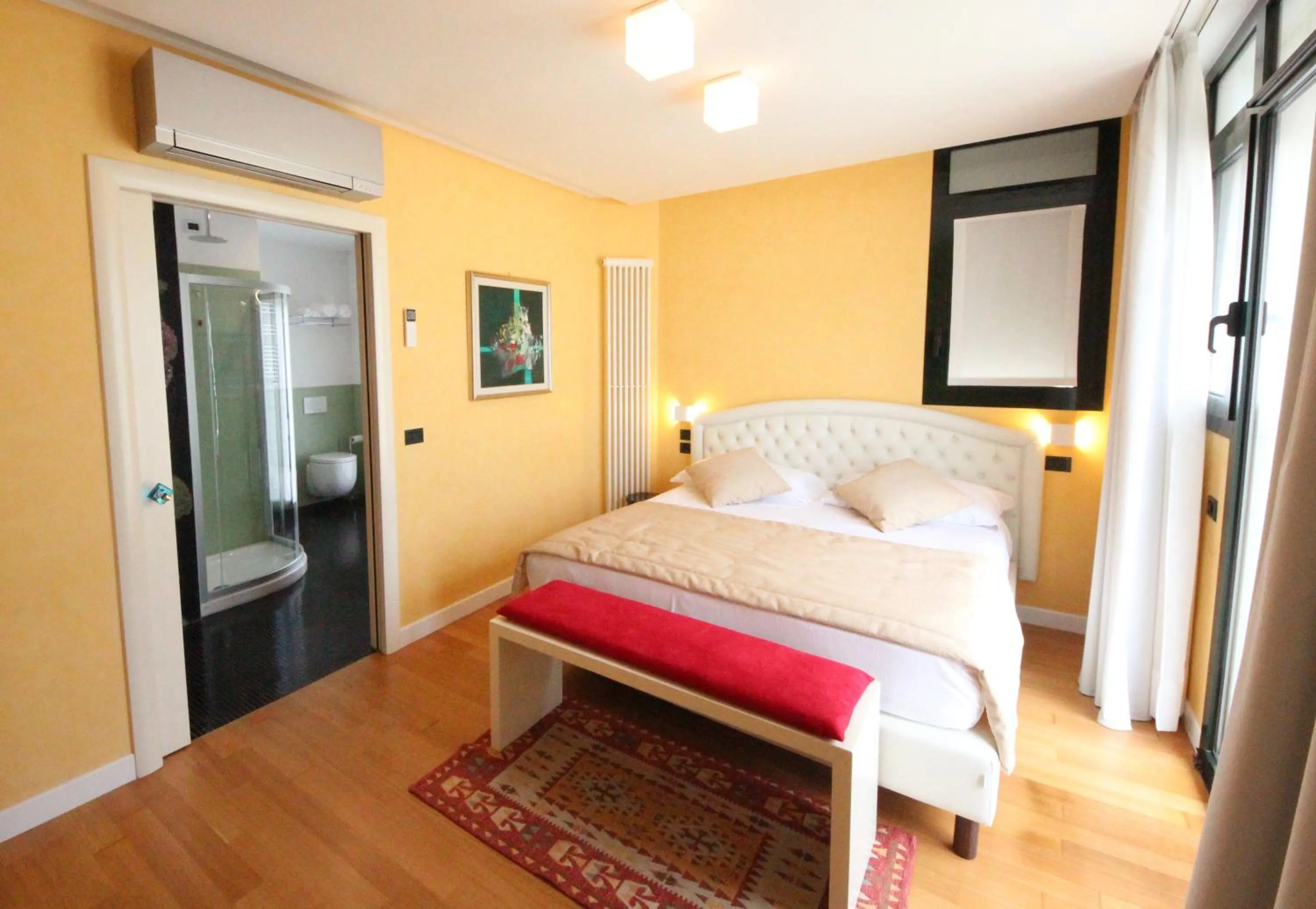 Bed in Ruhl Beach Hotel & Suites