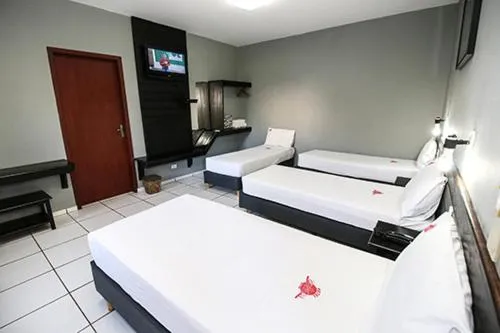 Bed in Hotel Pousada Bonsai