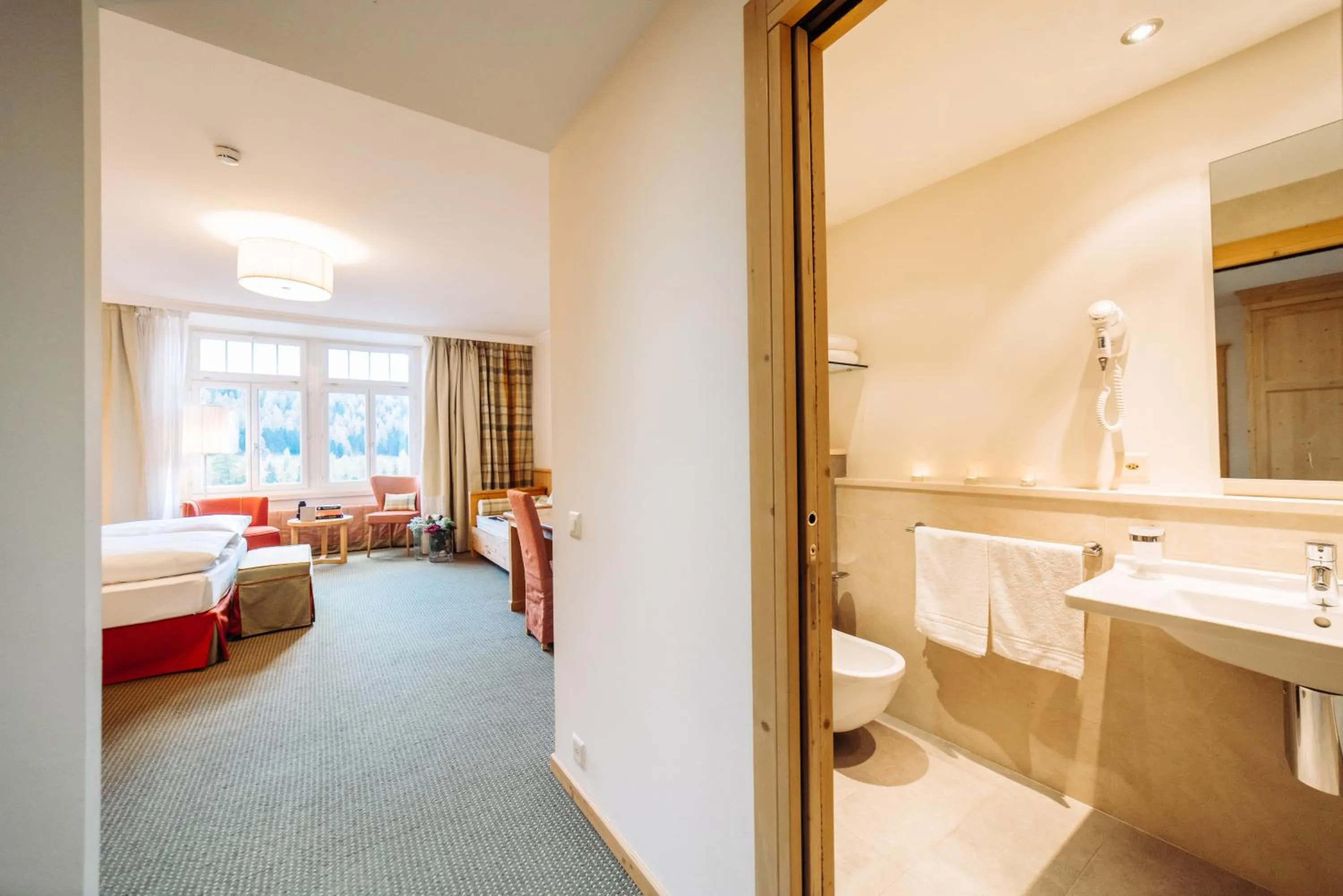 Bathroom, Bed in Schloss Hotel & Spa Pontresina