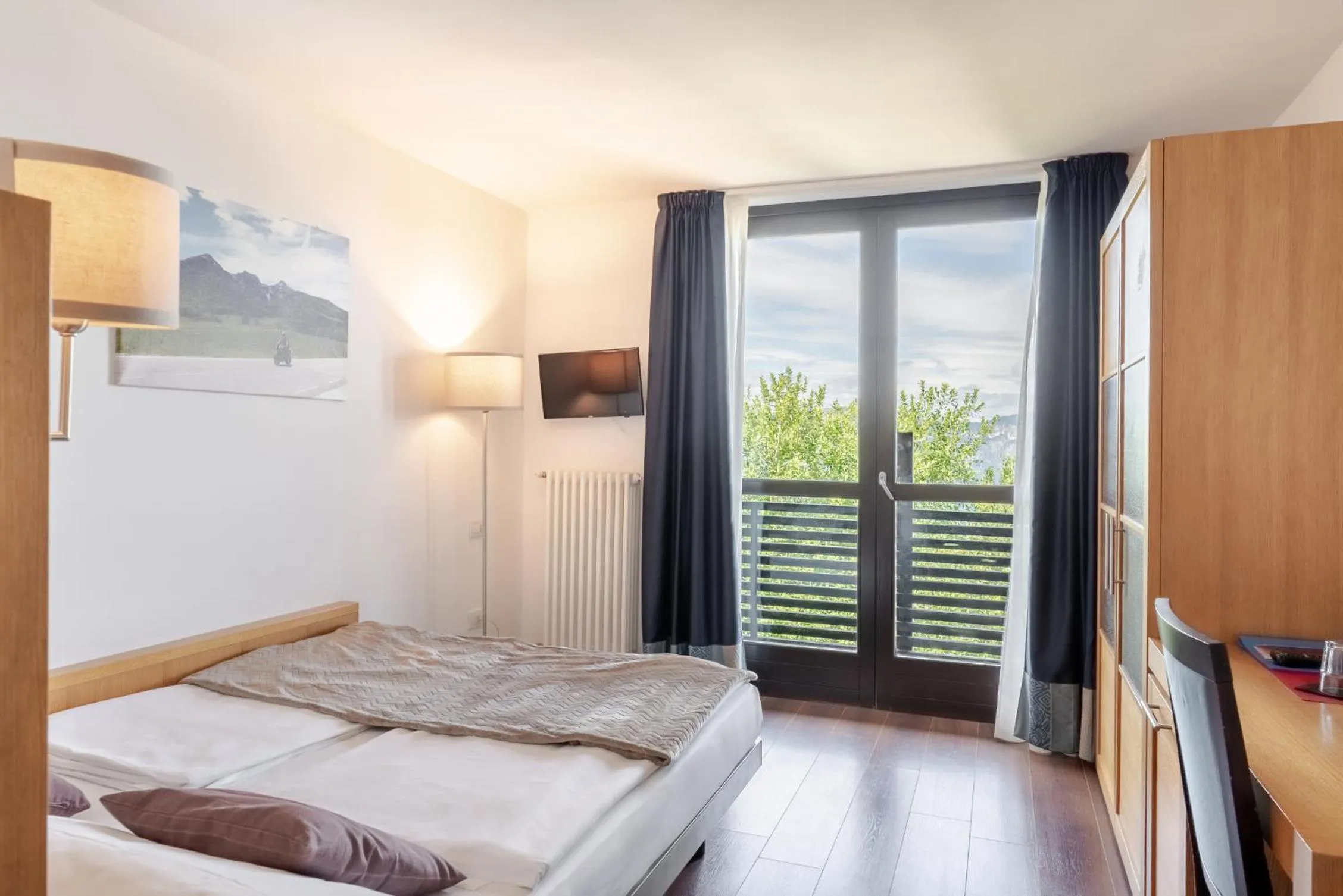 Bed in Hotel Dolomiti Chalet