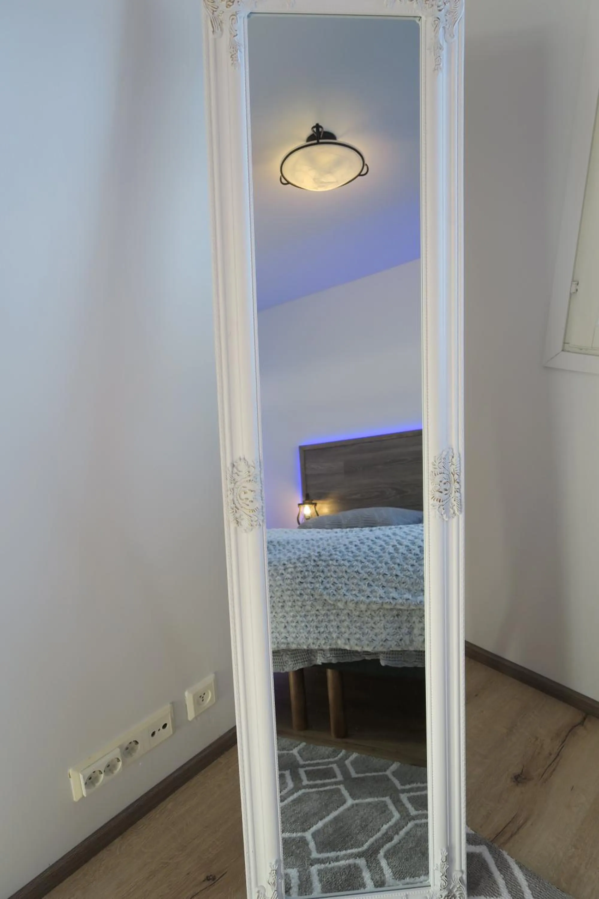 Decorative detail, Bed in Apartments Huili