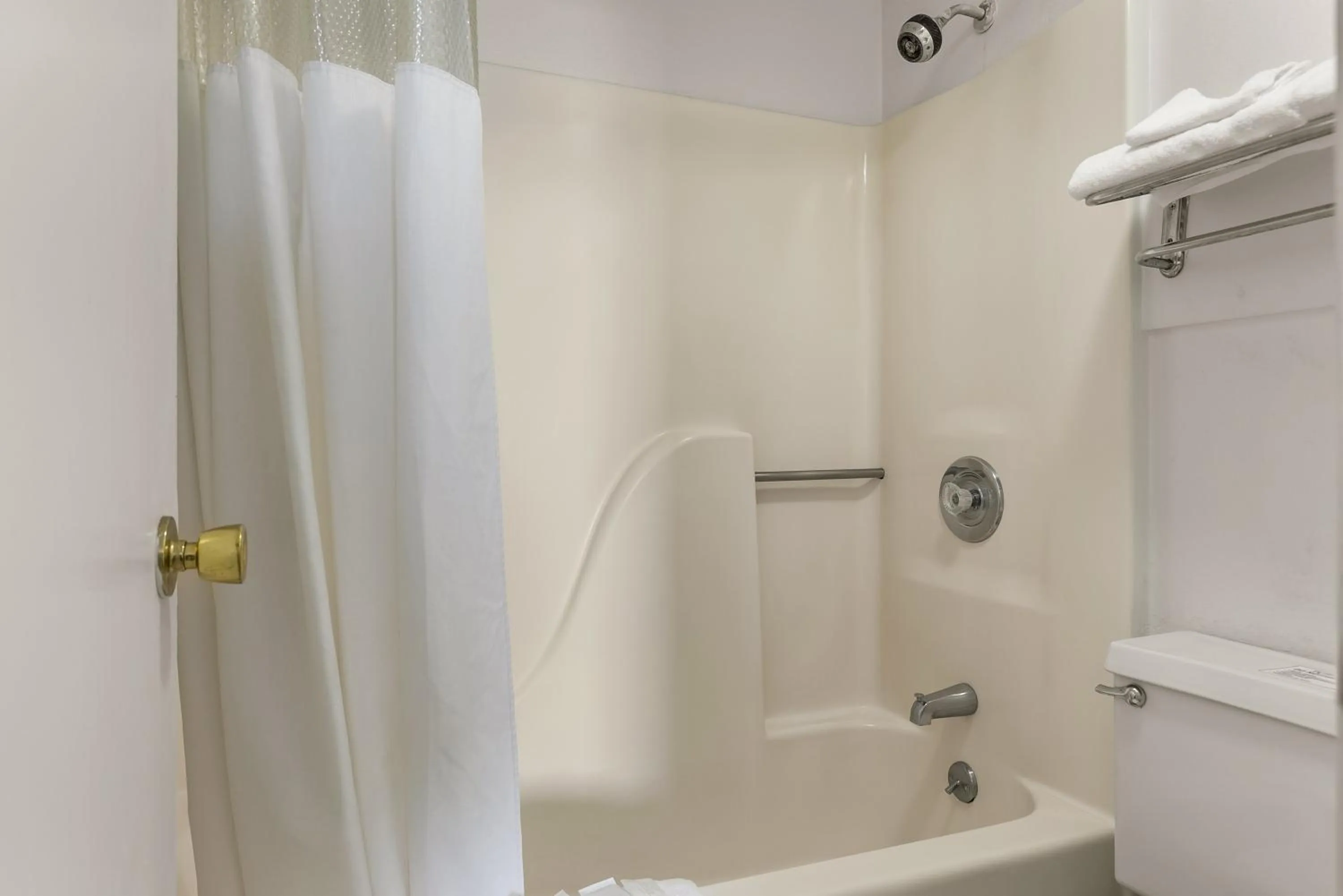 Shower in Americas Best Value Inn - Lincoln