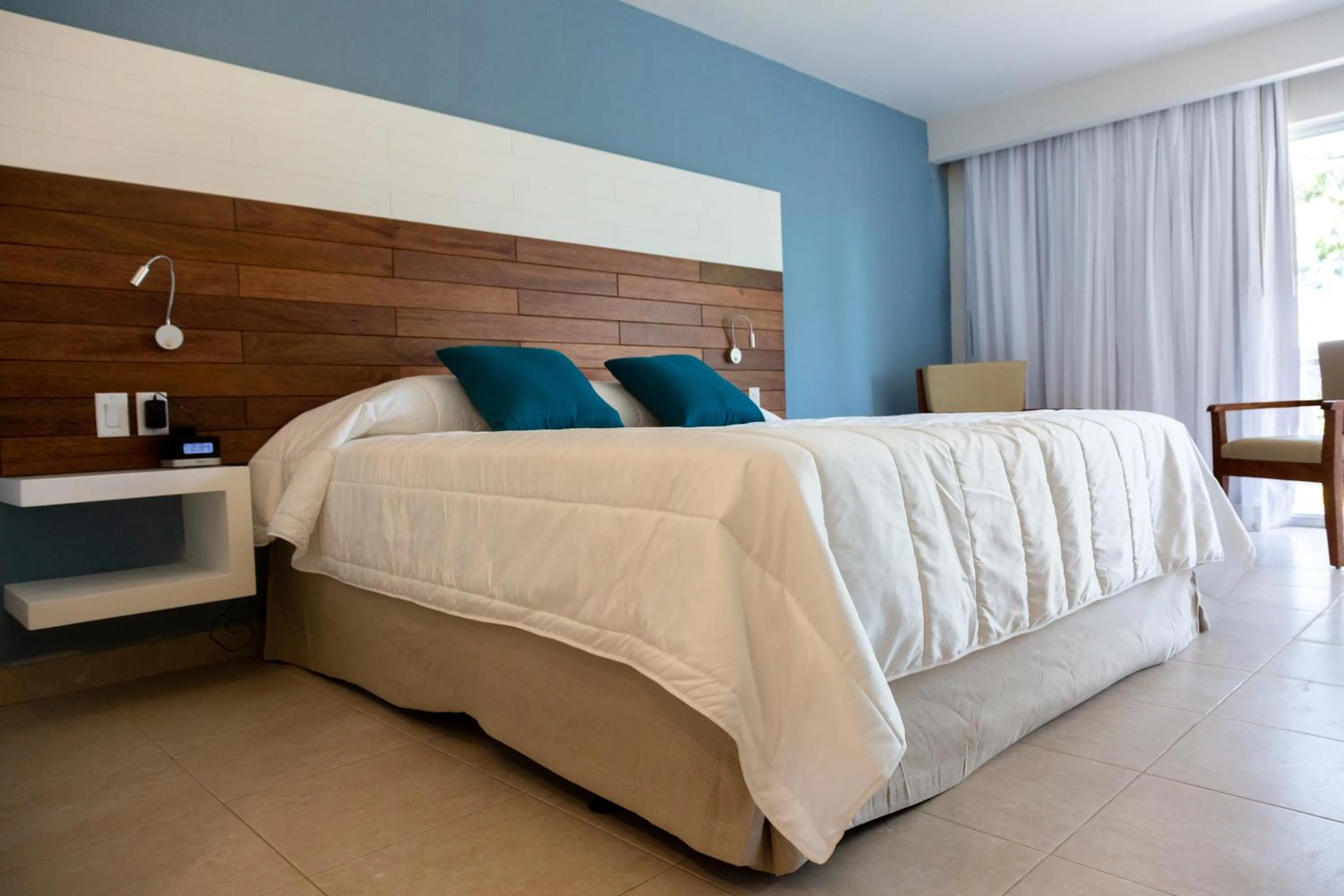 Bed in Viva Fortuna Beach by Wyndham, A Trademark All Inclusive