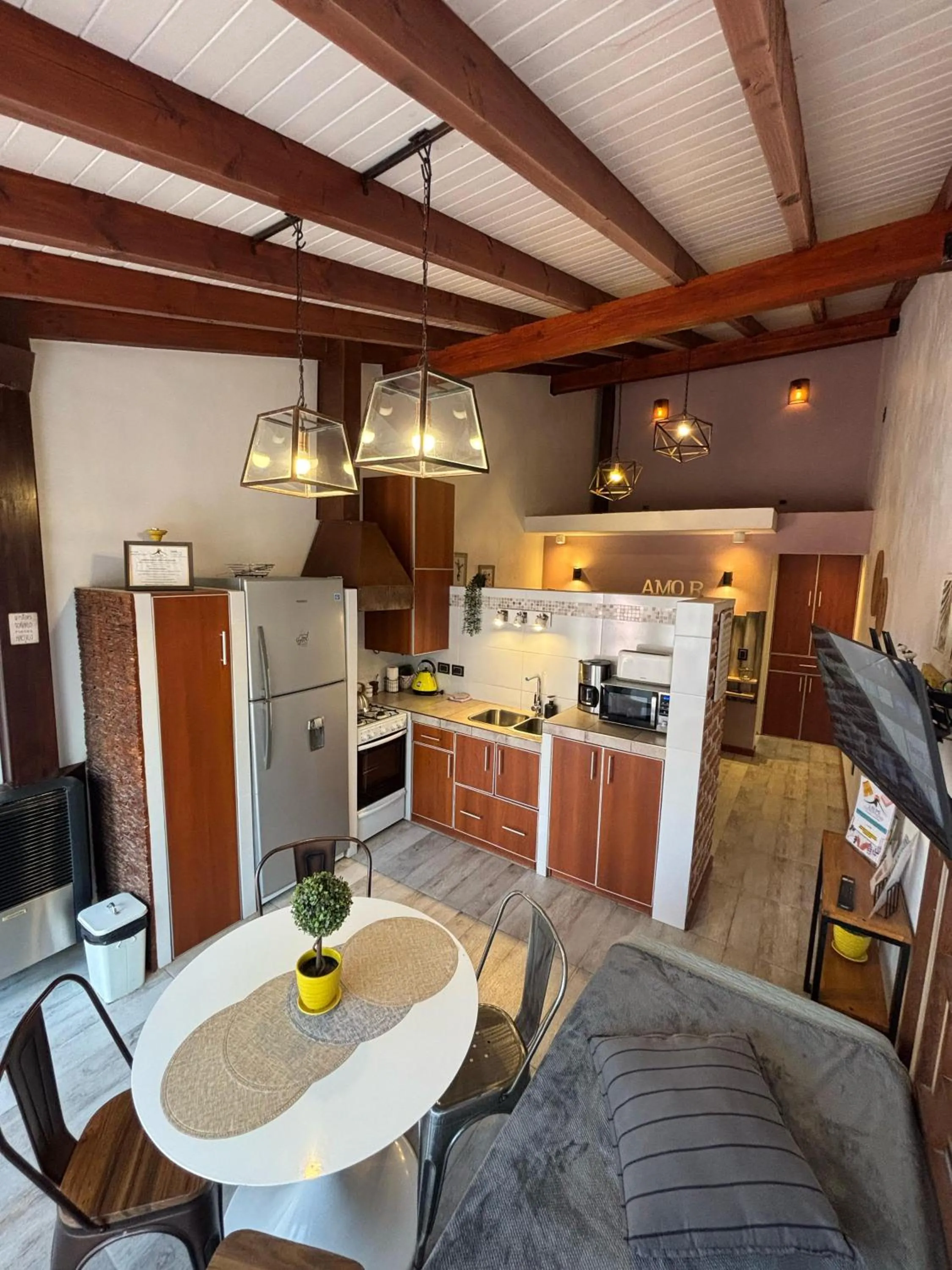 Kitchen or kitchenette in Cabañas Sublime Bolson