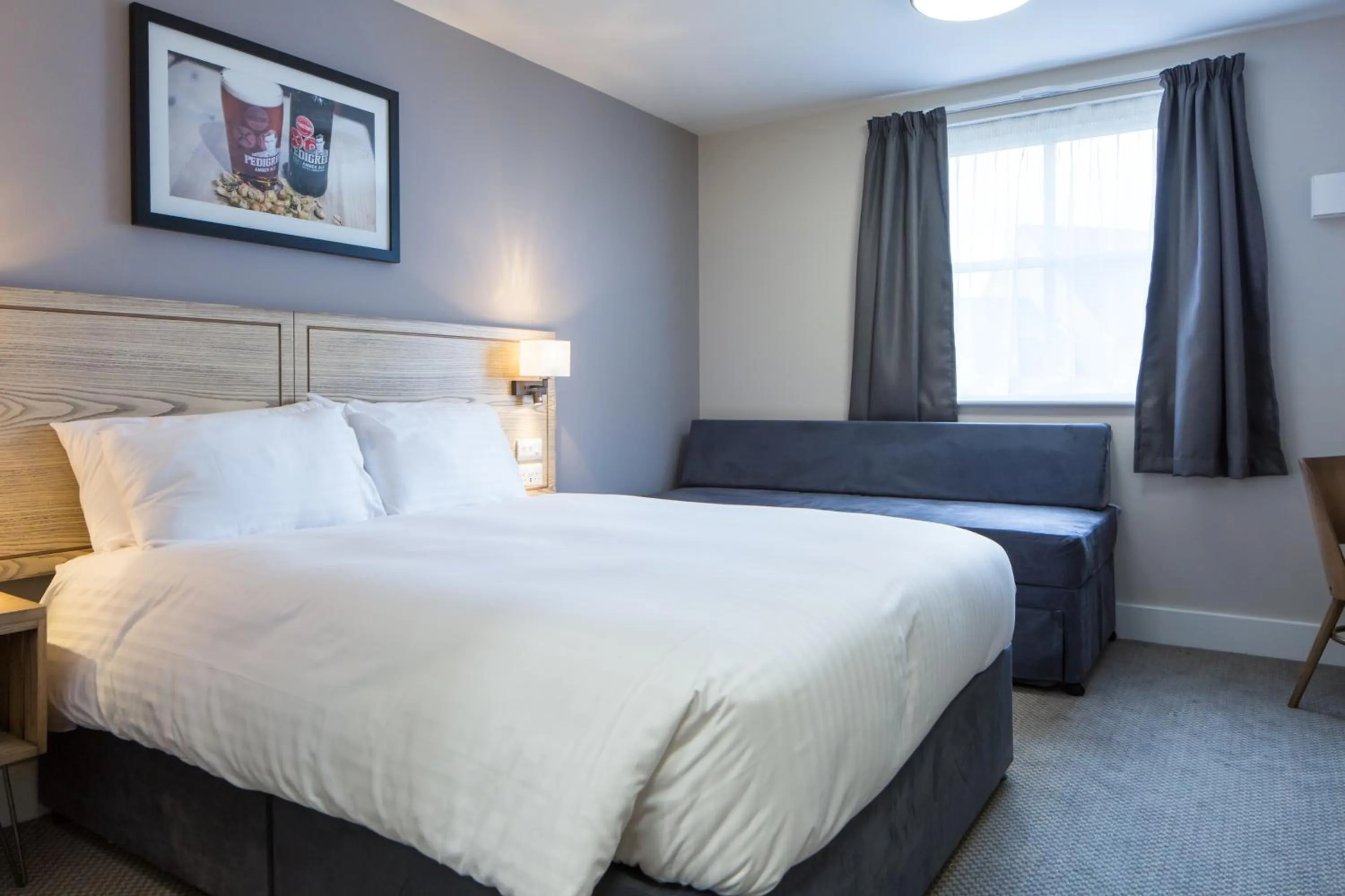 Bedroom, Bed in The Raven’s Cliff Lodge by Marston's Inns