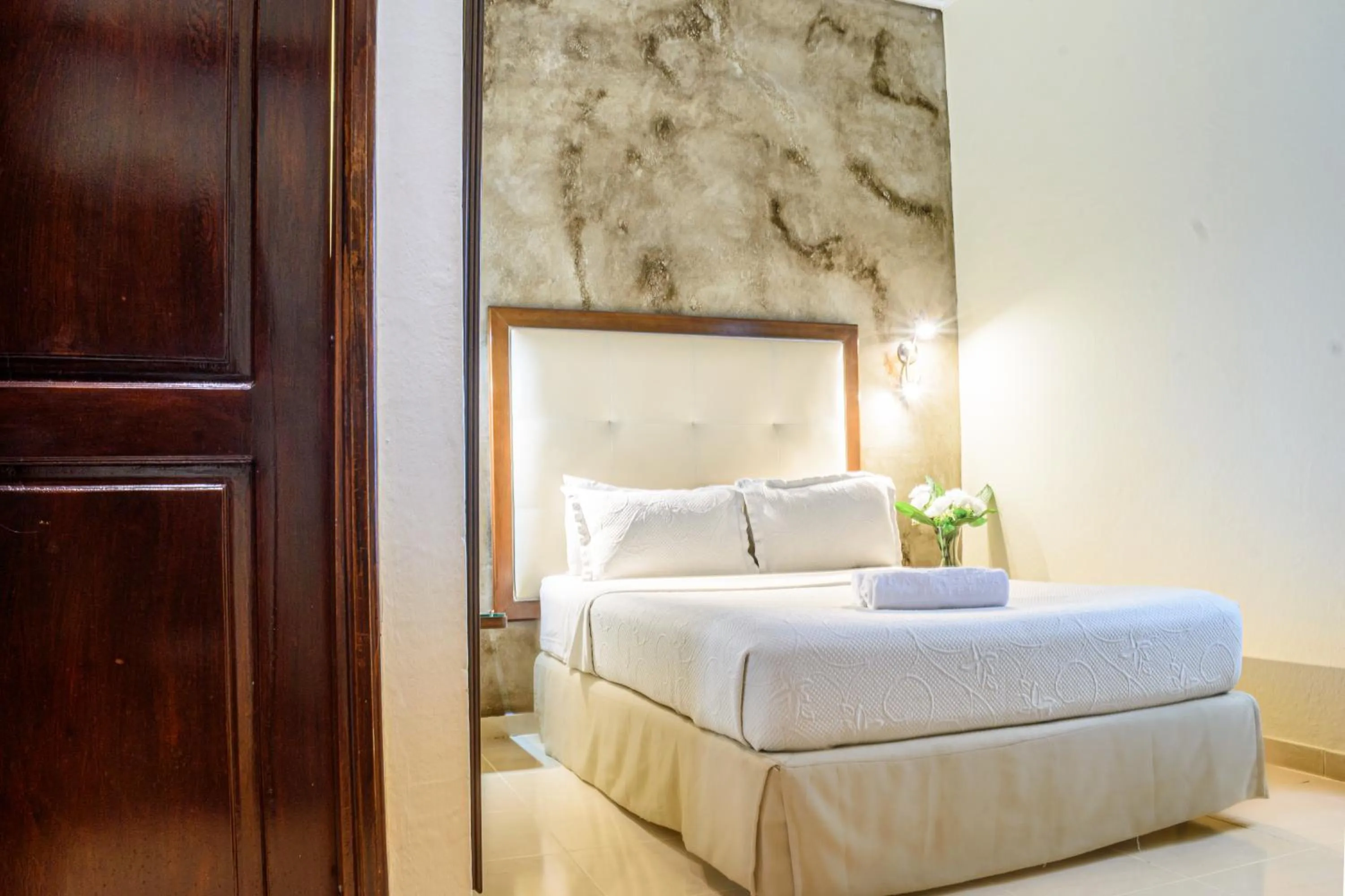 Photo of the whole room, Bed in Hotel Virrey Cartagena