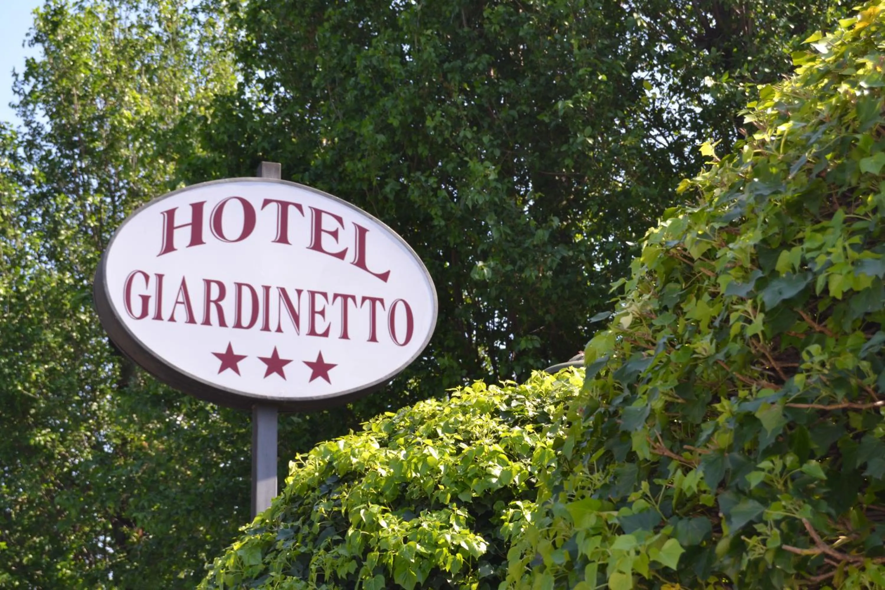 Property logo or sign in Hotel Giardinetto