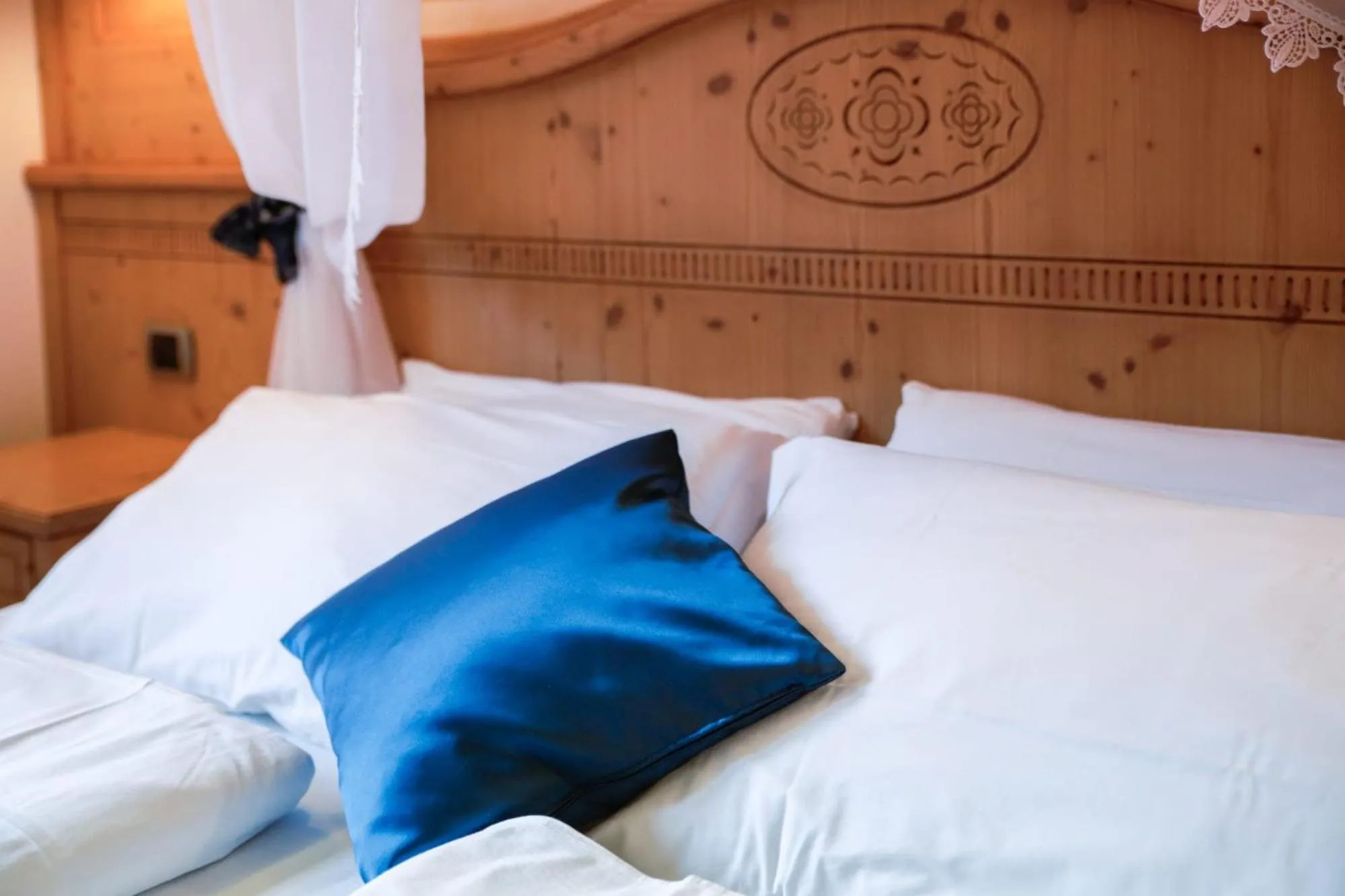 Bed in Nivis Hotel
