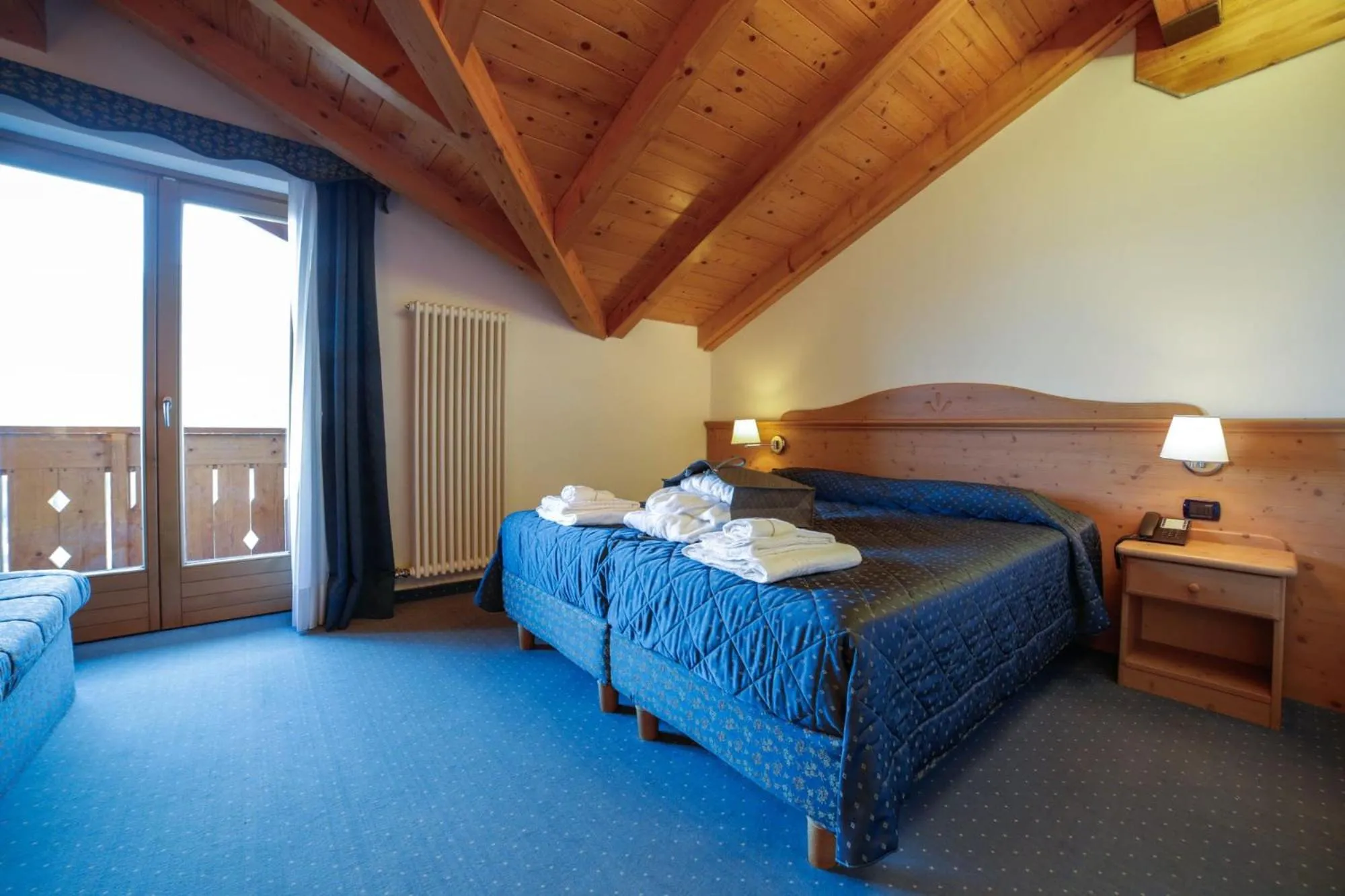 Bed in Nivis Hotel