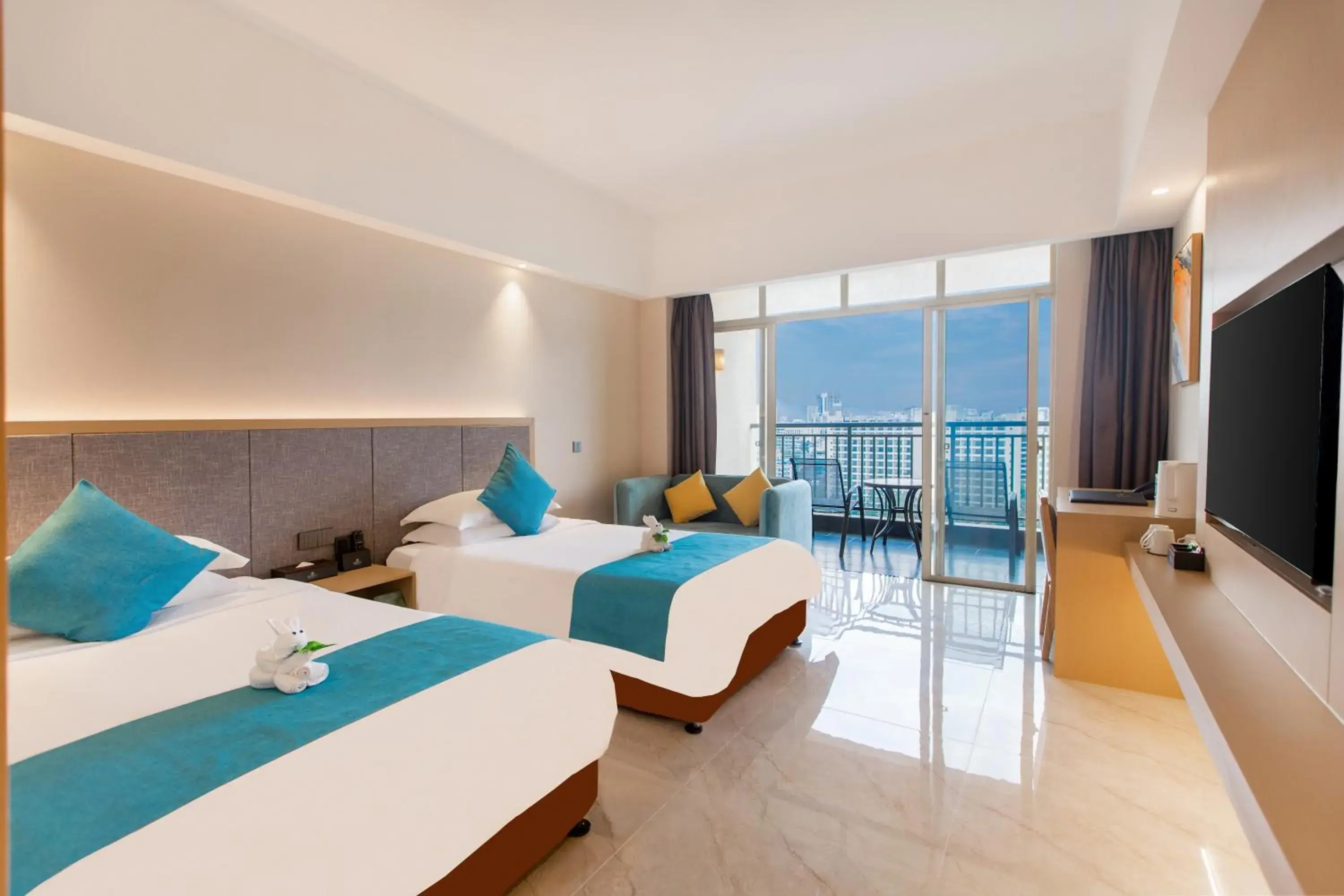 Deluxe Twin Room with Side Sea View in Shengyi Holiday Villa Hotel Deluxe Twin Room with Side Sea View in Shengyi Holiday Villa Hotel