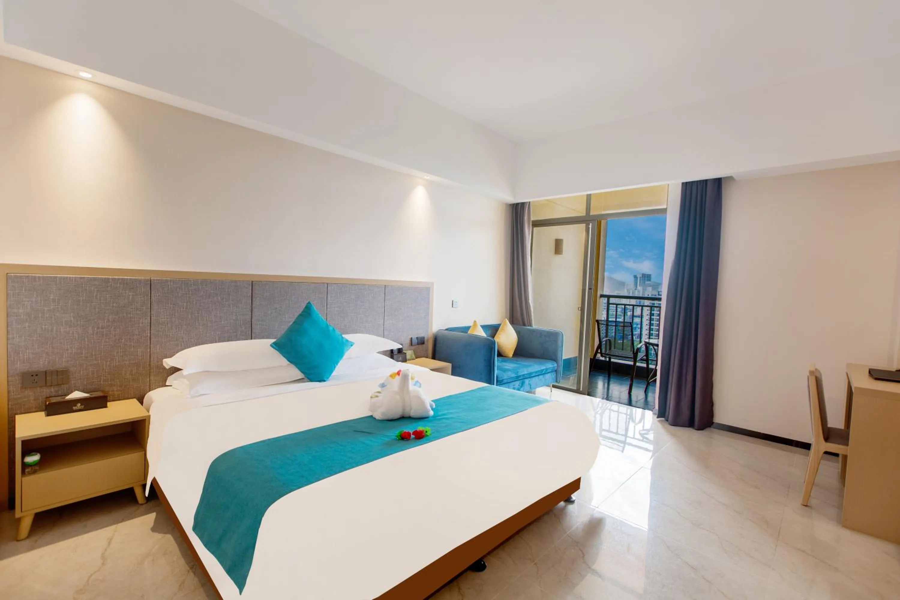 Bed in Shengyi Holiday Villa Hotel