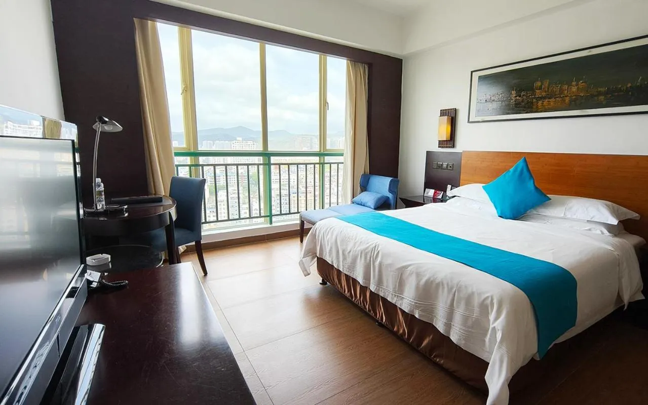 Bed in Shengyi Holiday Villa Hotel