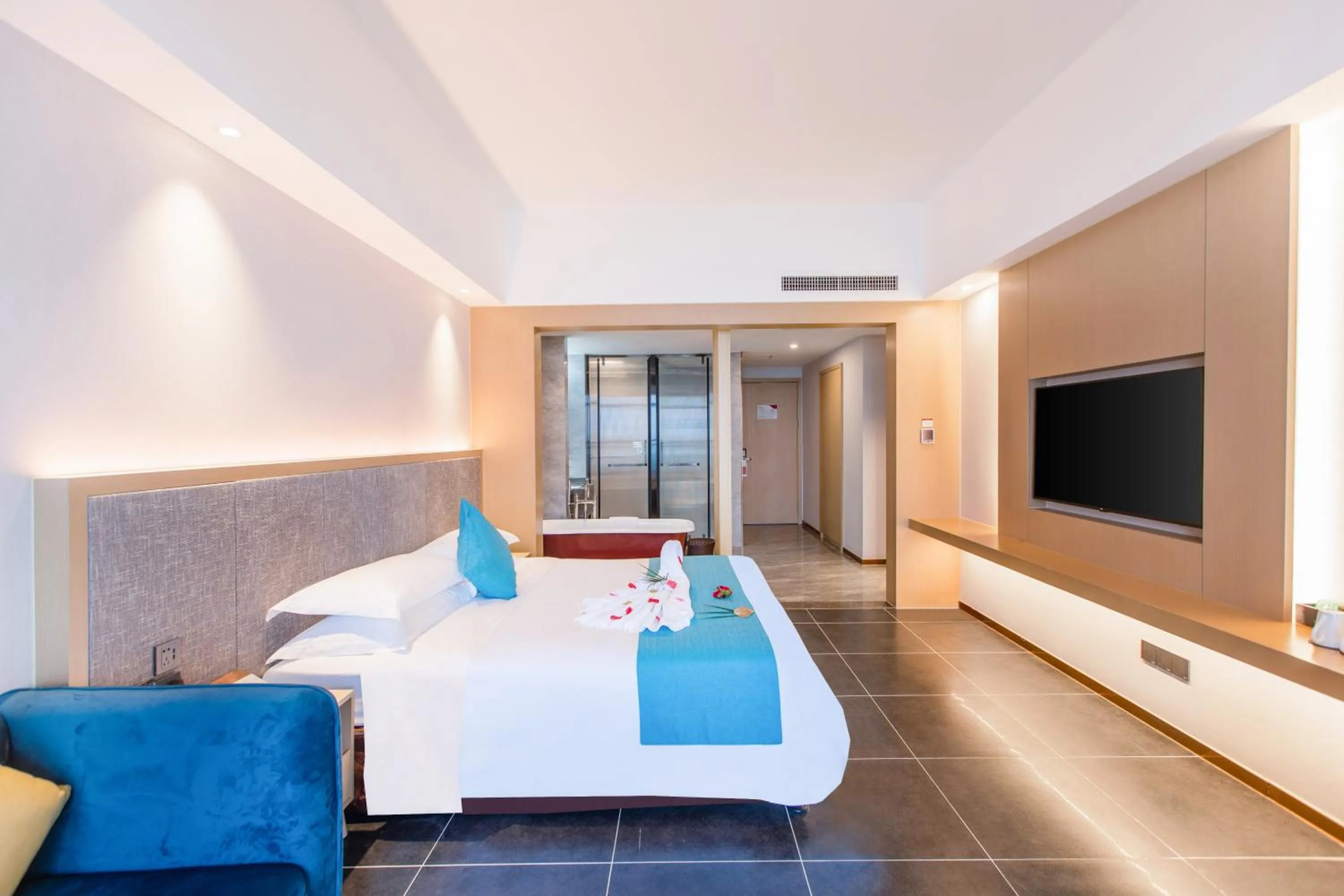 Bed in Shengyi Holiday Villa Hotel