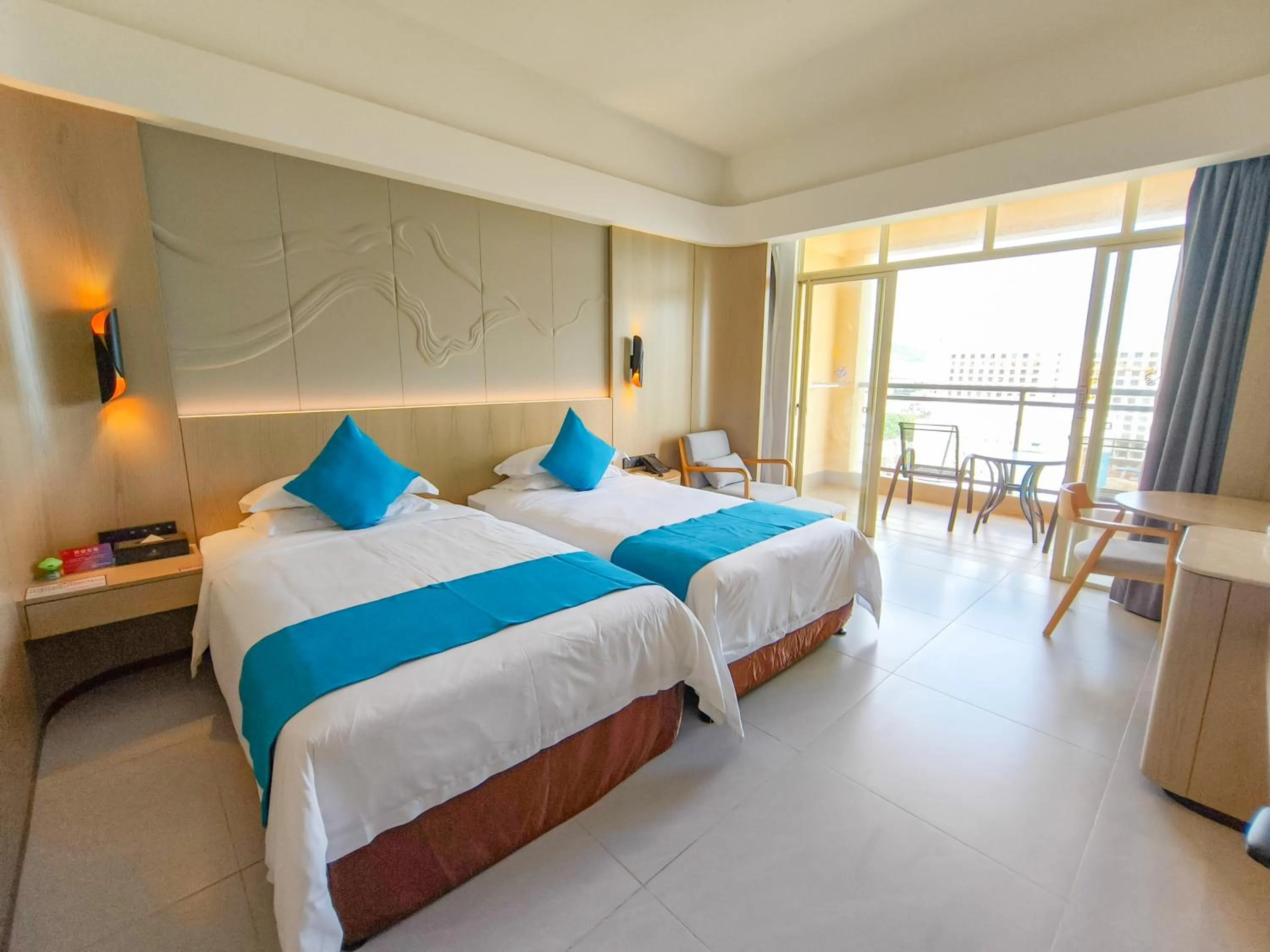 Bed in Shengyi Holiday Villa Hotel