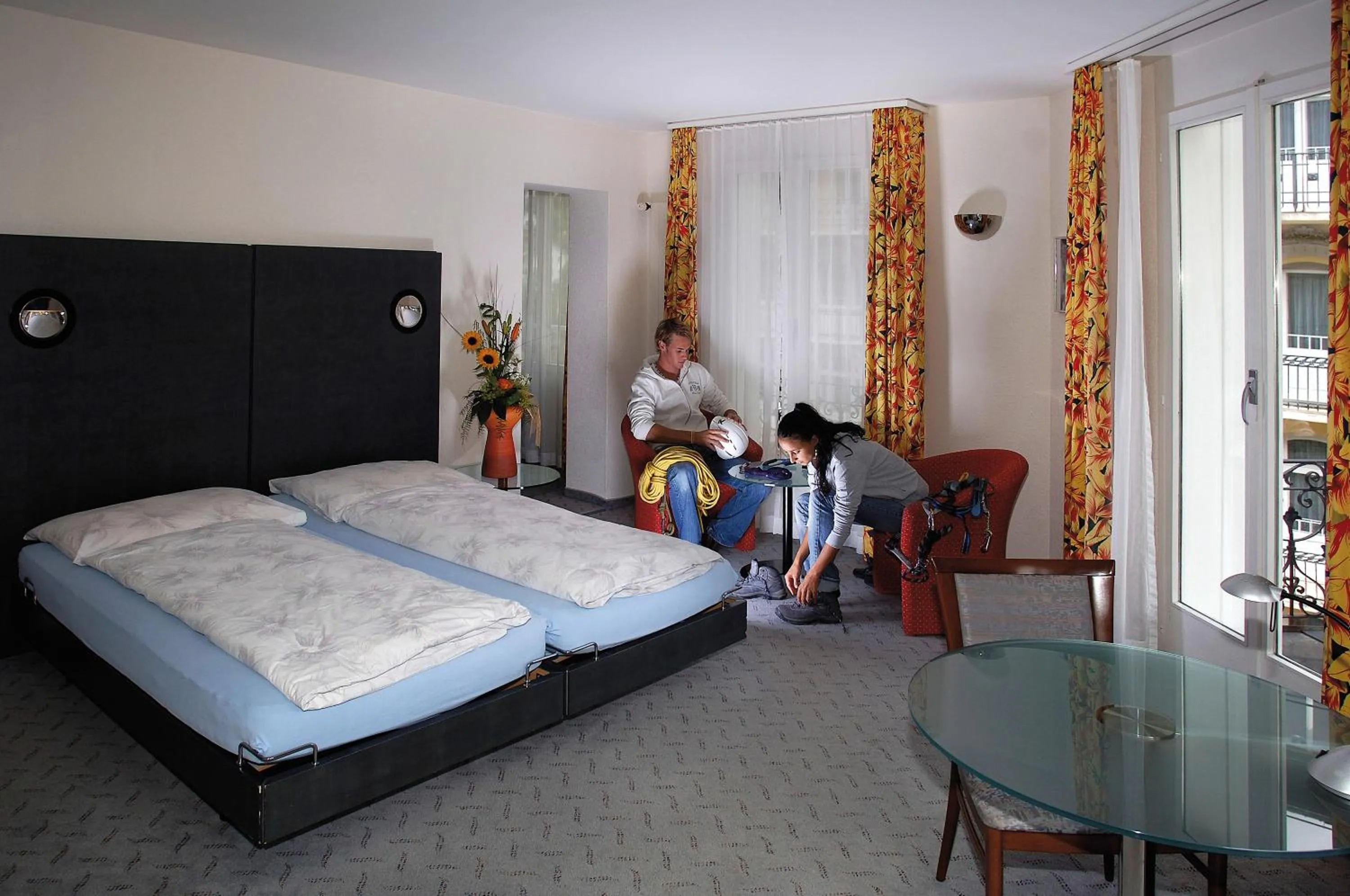 Photo of the whole room, Bed in Hotel Schweizerhof