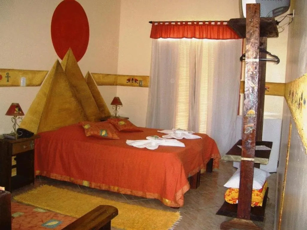 Photo of the whole room, Bed in Peruíbe Suíte Flat Hotel