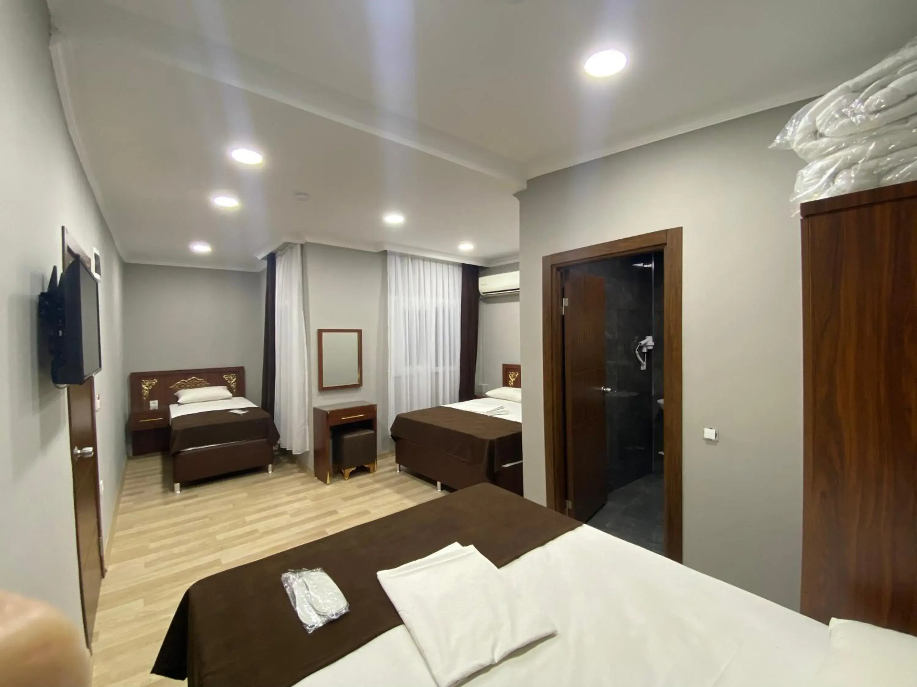 Bed in Grand Oral Hotel Bed in Grand Oral Hotel