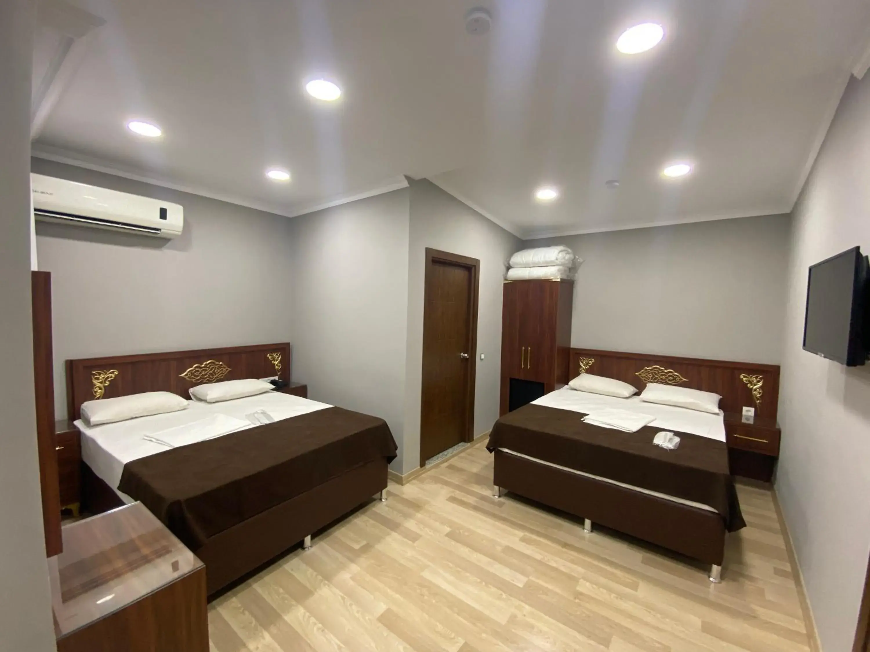 Bed in Grand Oral Hotel Bed in Grand Oral Hotel