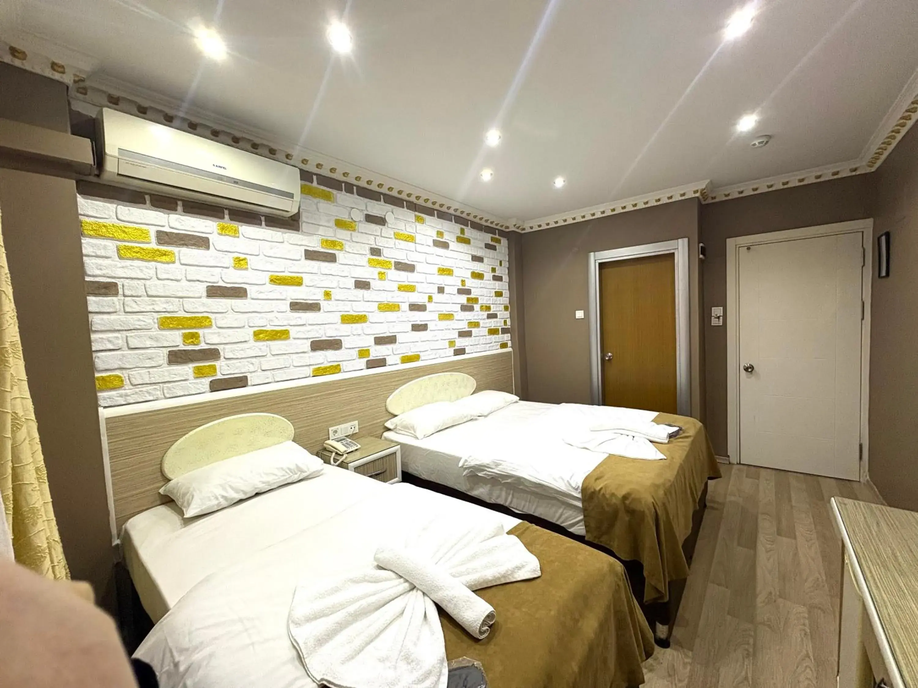 Bed in Grand Oral Hotel Bed in Grand Oral Hotel