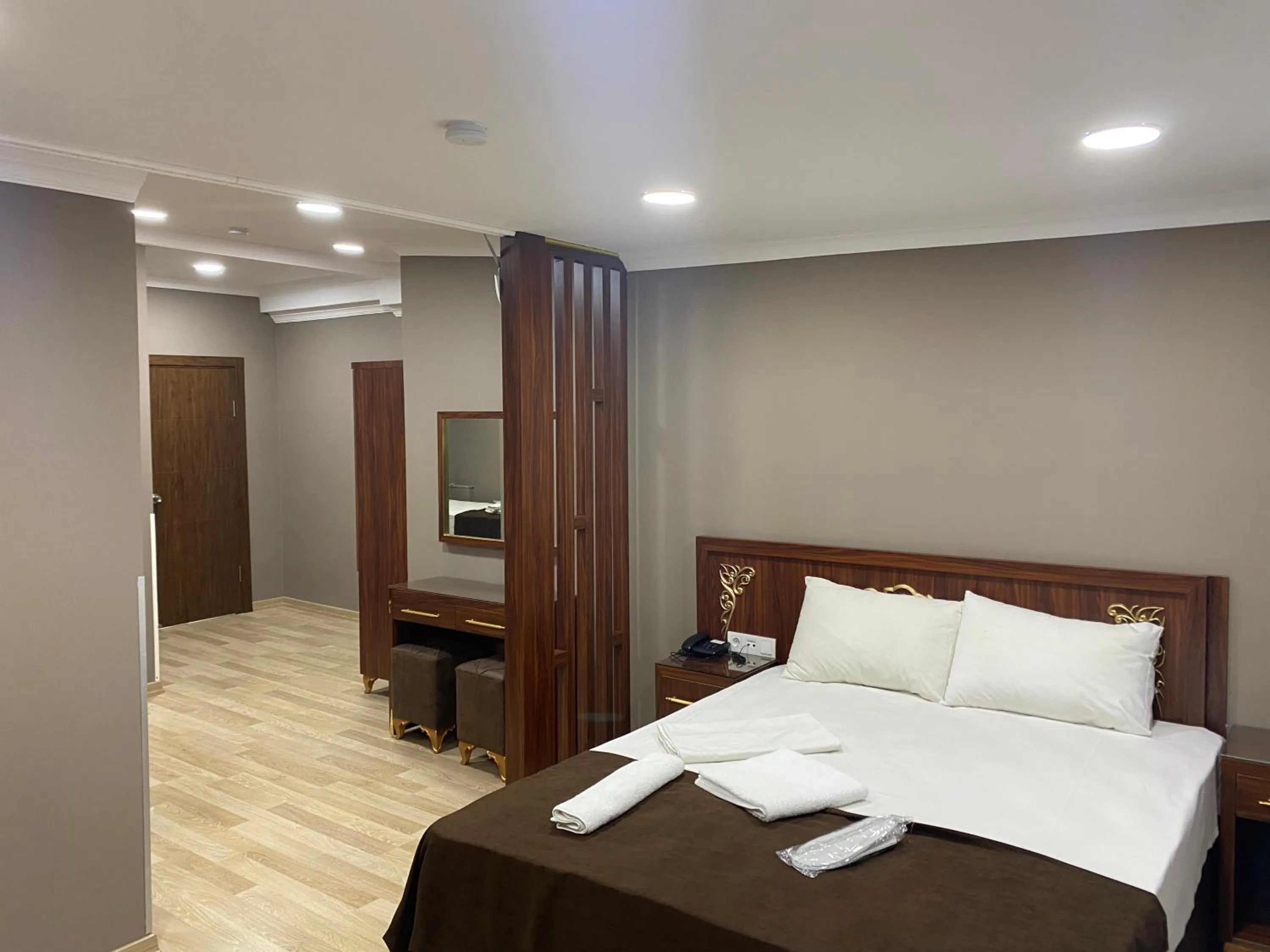 Bed in Grand Oral Hotel