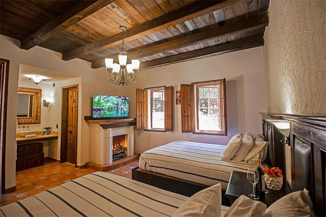 Bed in Hotel Boutique Hacienda Caudillos