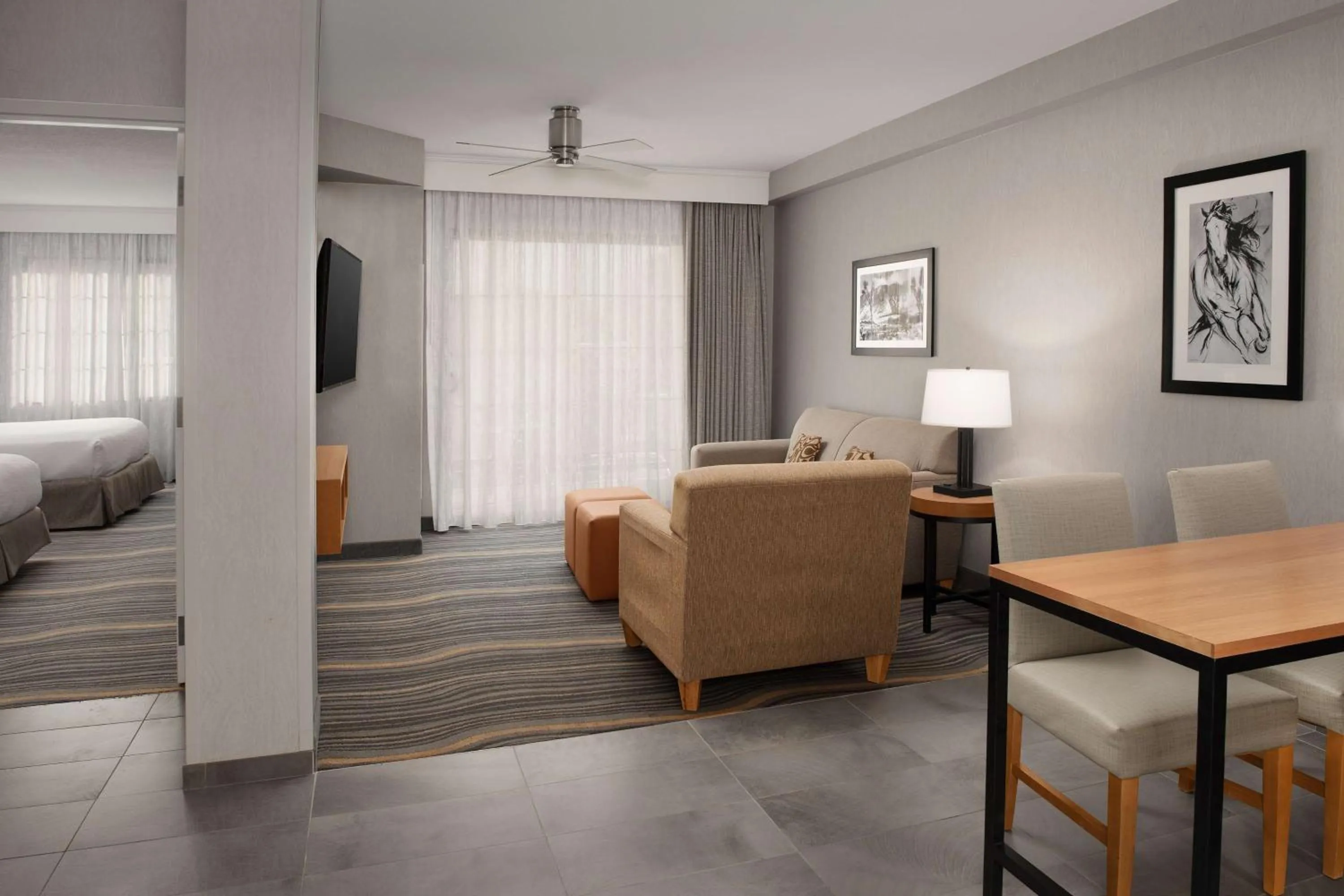 Living room, Bed in Embassy Suites La Quinta Hotel & Spa