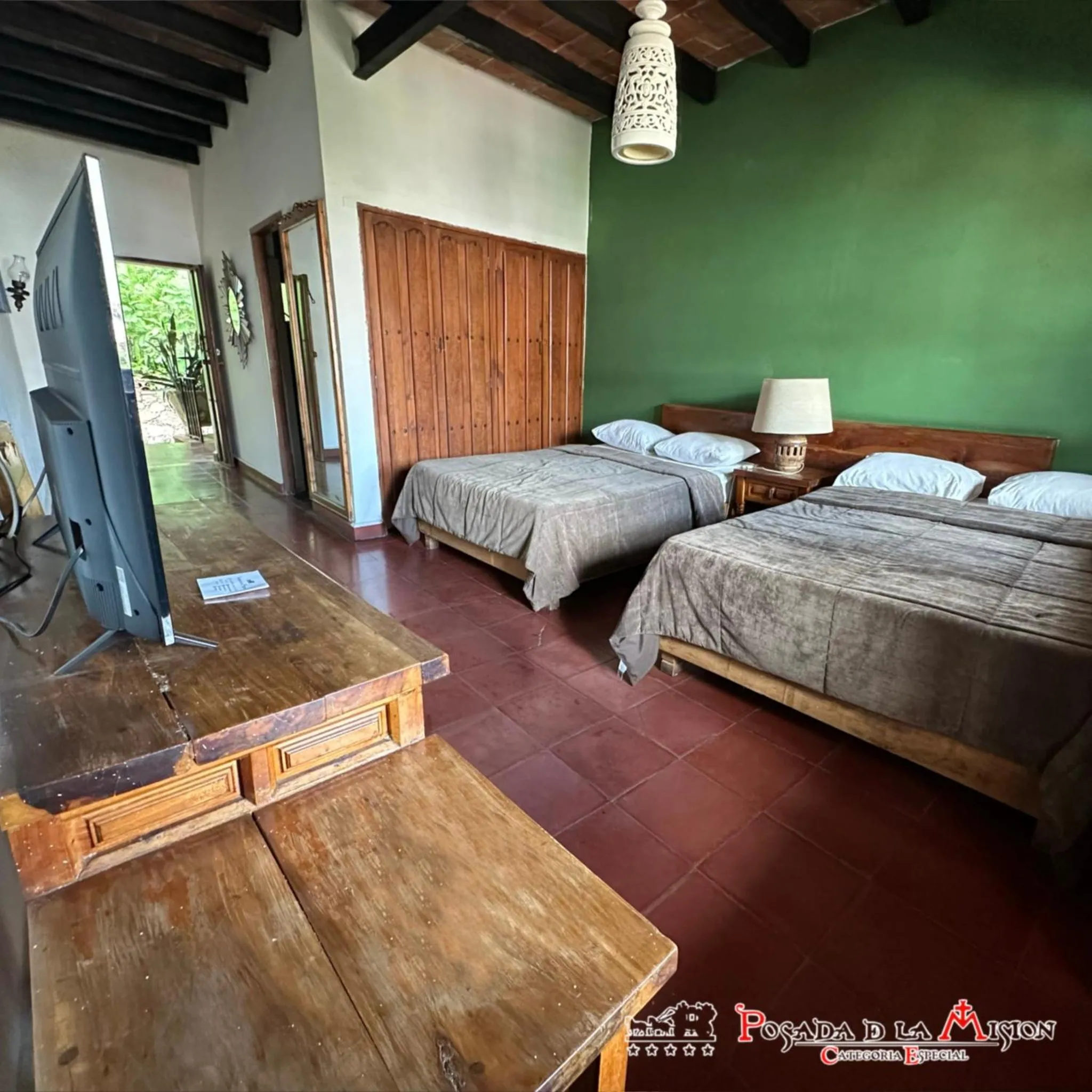 Bed in Posada de la Mision, Hotel Museo y Jardin