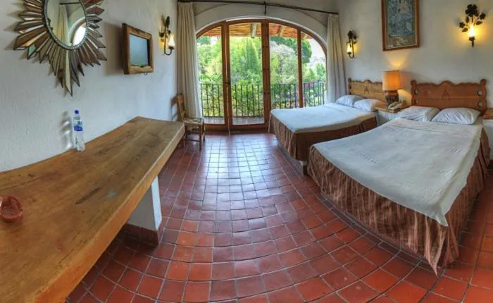 Balcony/Terrace, Bed in Posada de la Mision, Hotel Museo y Jardin