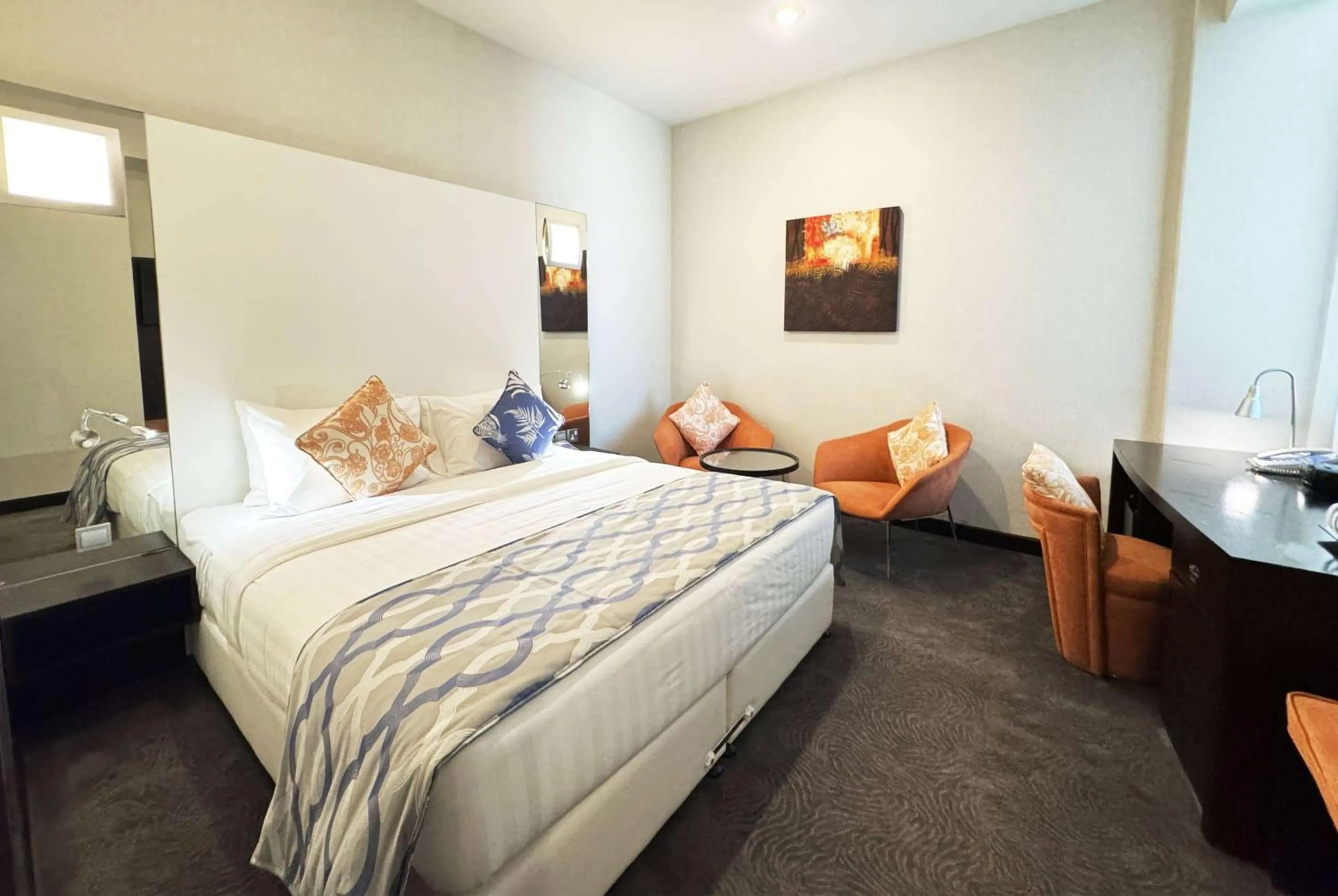 Photo of the whole room, Bed in Ramada Encore Doha by Wyndham