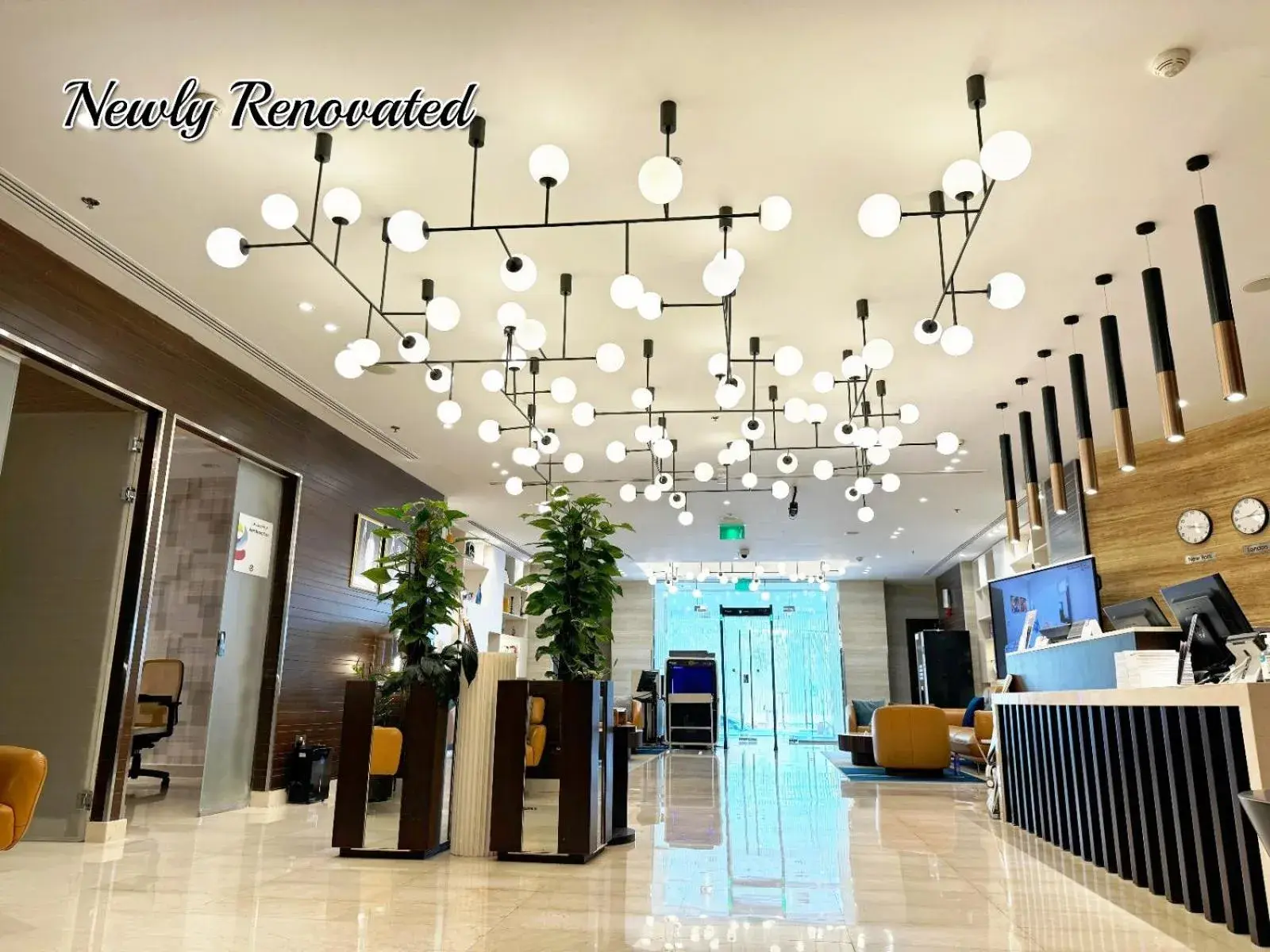 Lobby or reception in Ramada Encore Doha by Wyndham Lobby or reception in Ramada Encore Doha by Wyndham