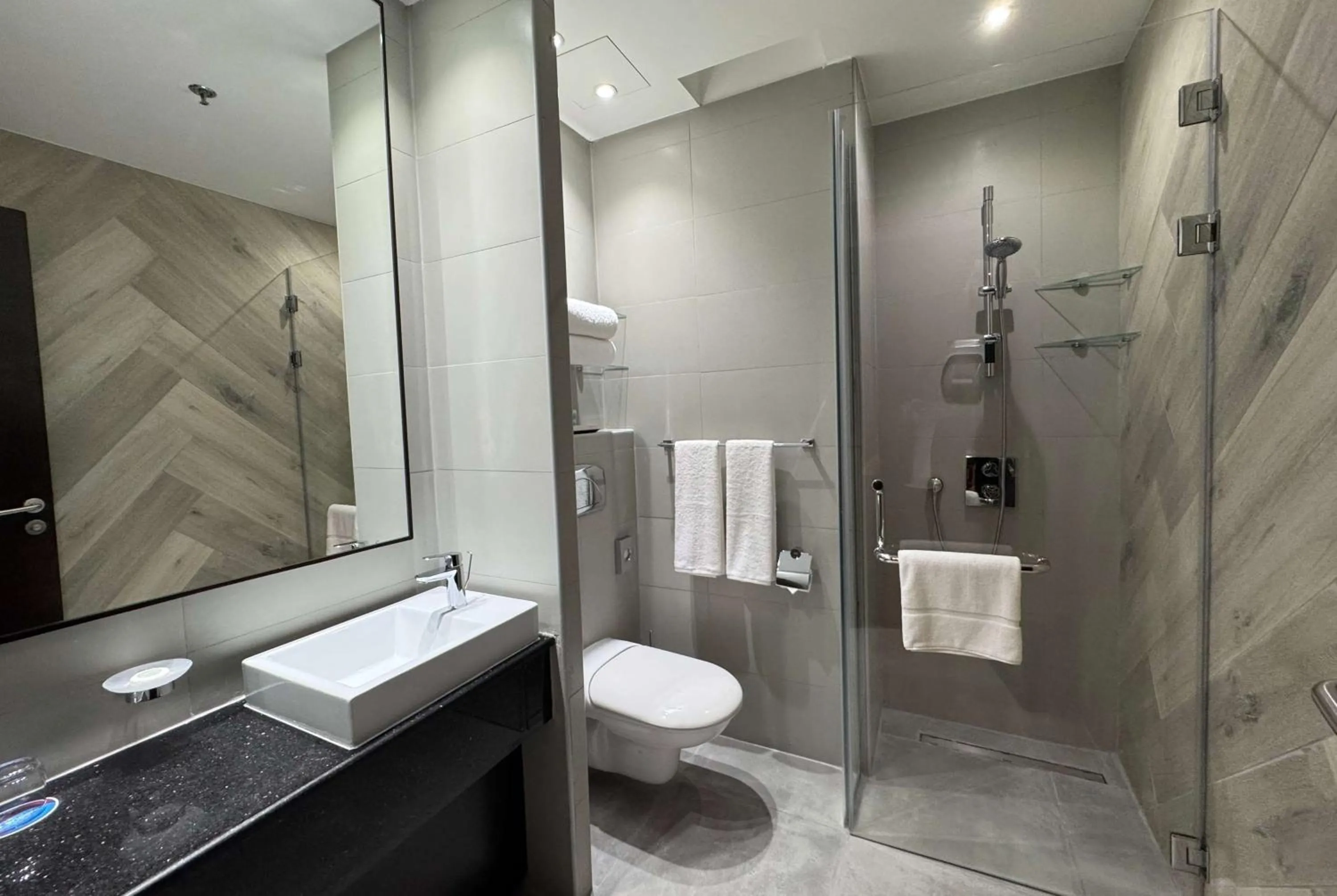 Bathroom in Ramada Encore Doha by Wyndham