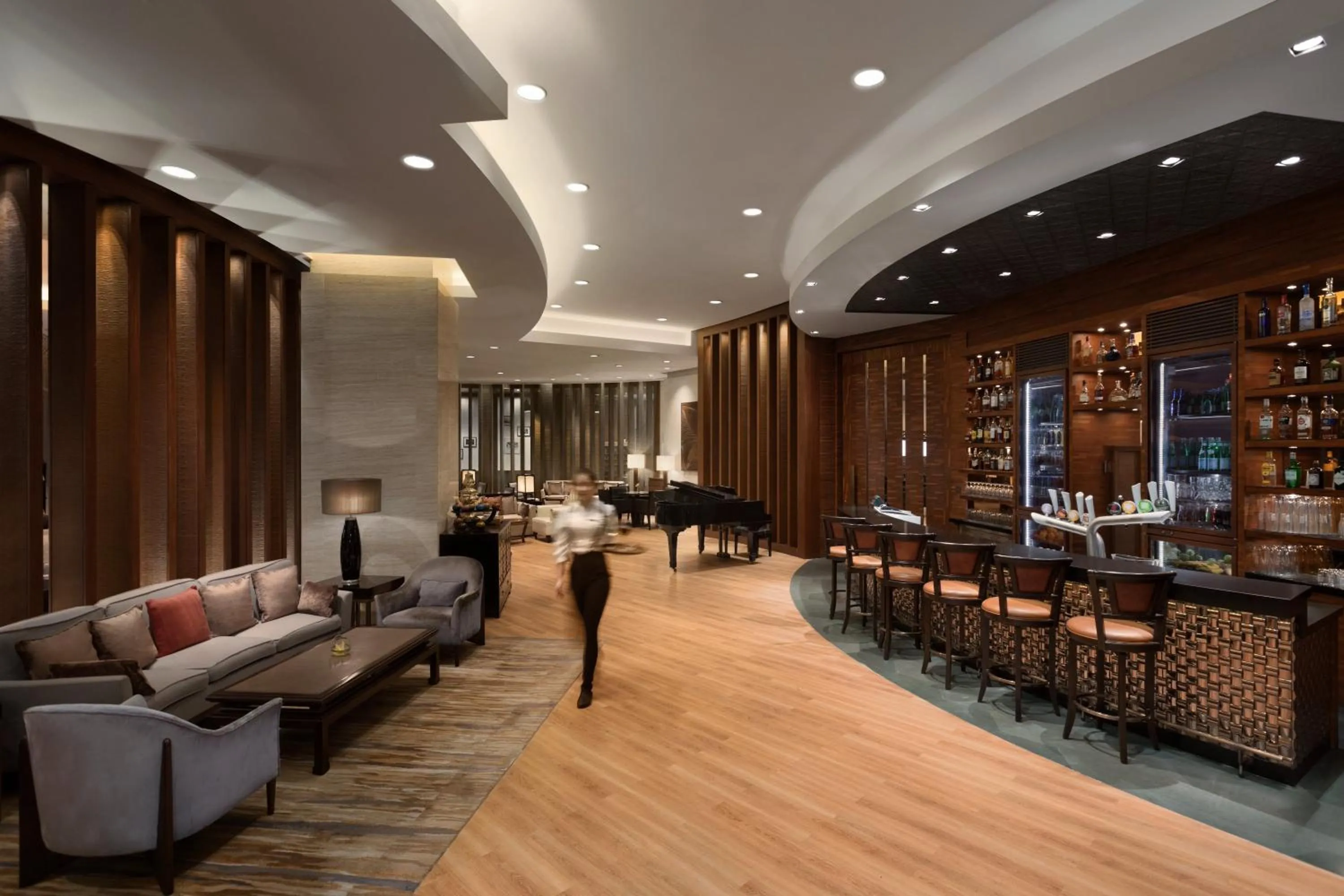 Lounge or bar in Kerry Hotel Pudong, Shanghai - Indoor Connecting to Shanghai New International Expo Centre