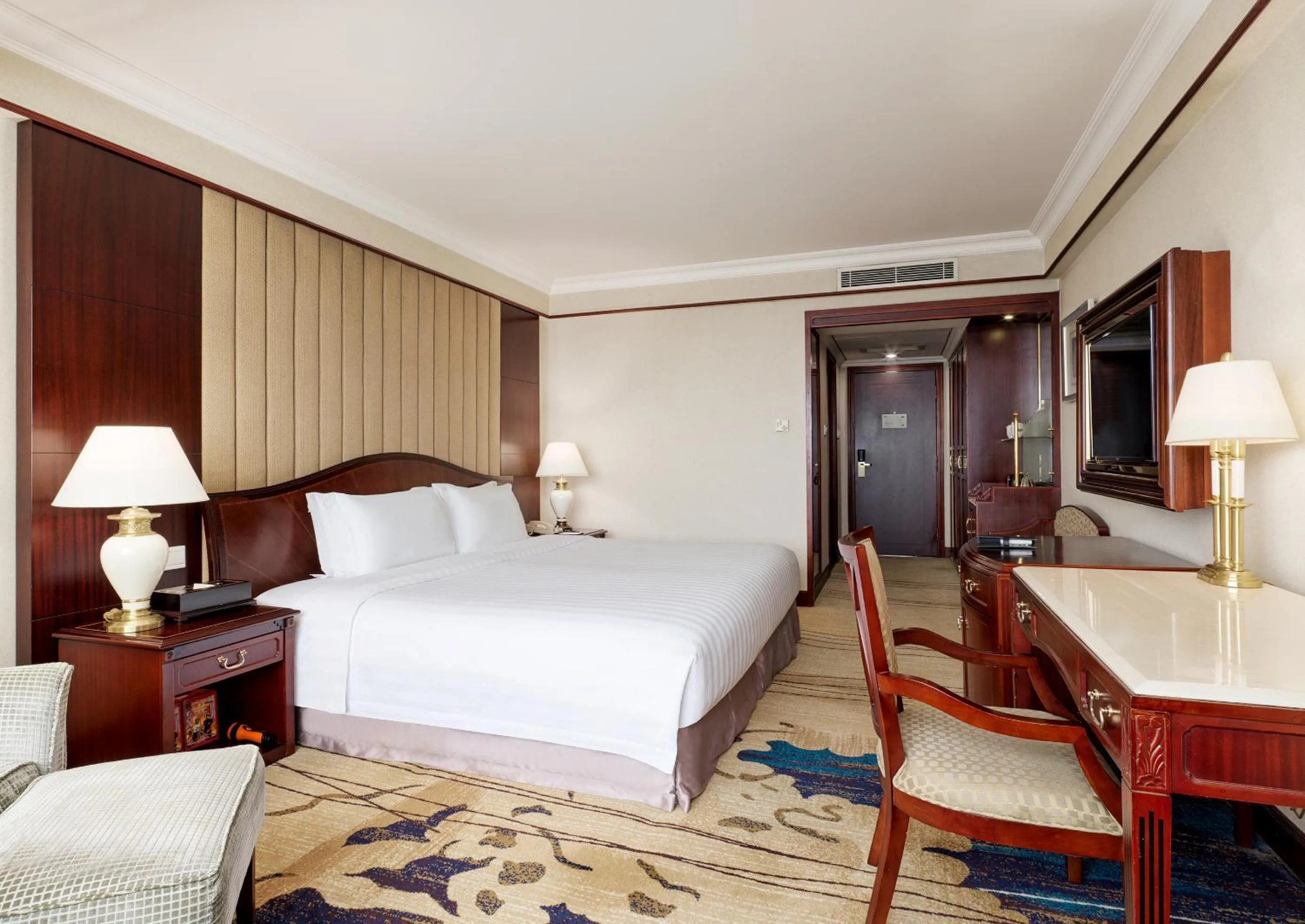 Bed in Regal Palace Hotel