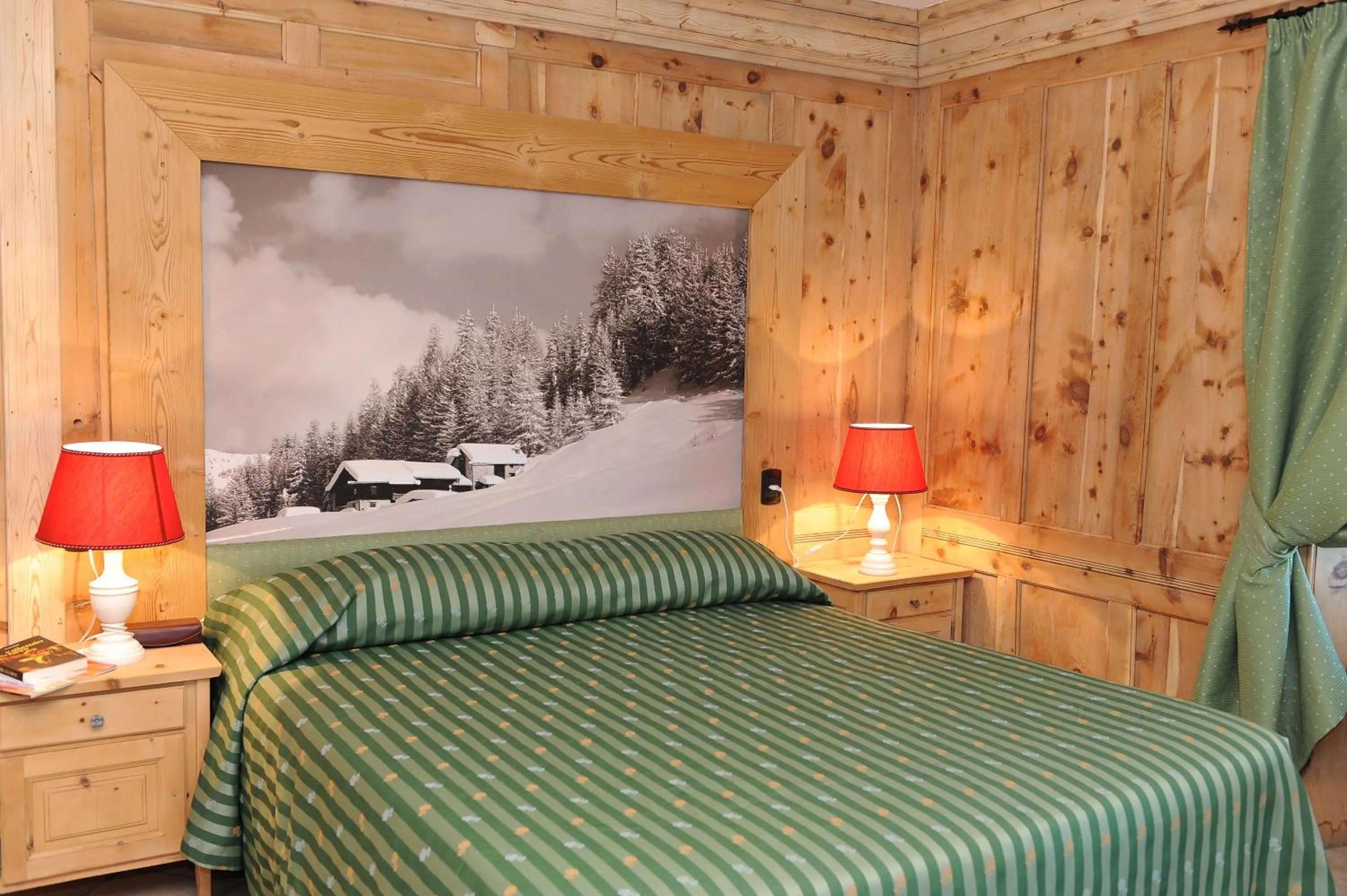 Bed in Hotel Alpina
